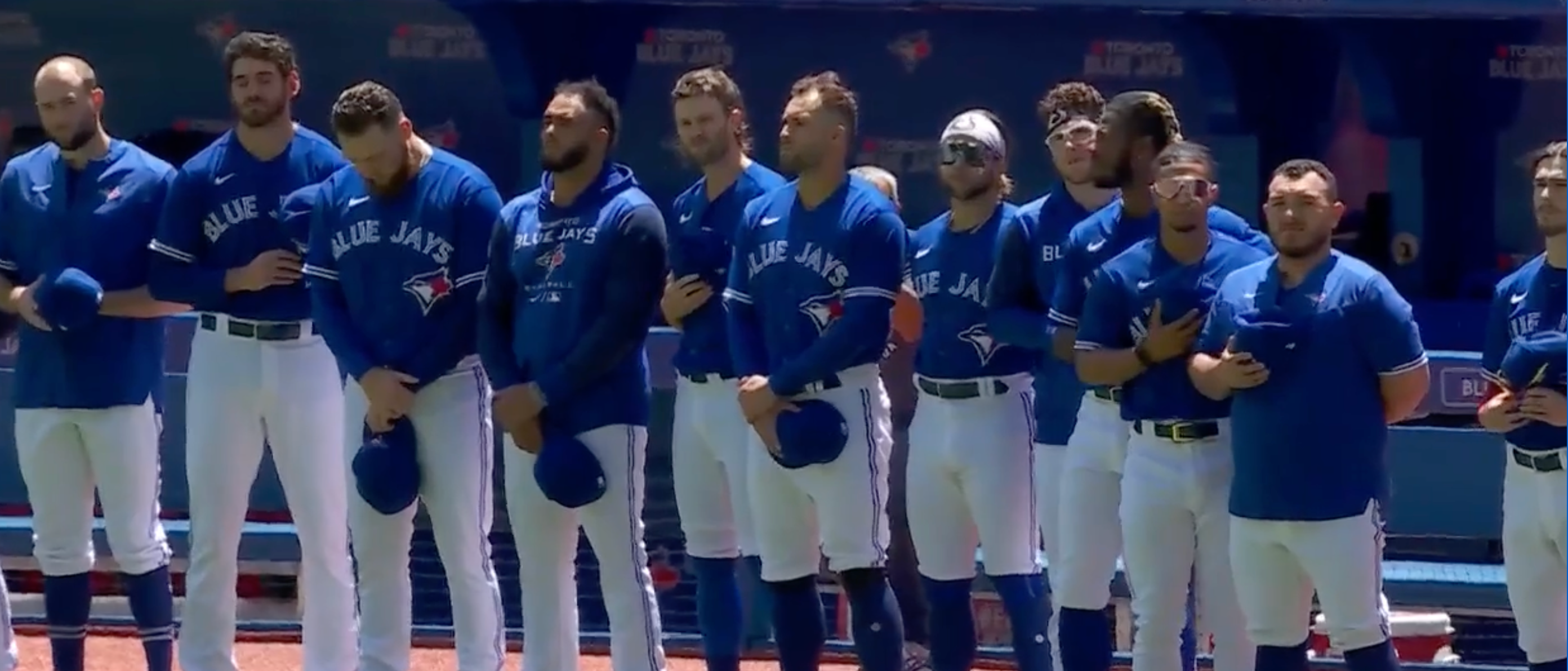 Toronto Blue Jays players during a moment of silence for Julia Budzinski.