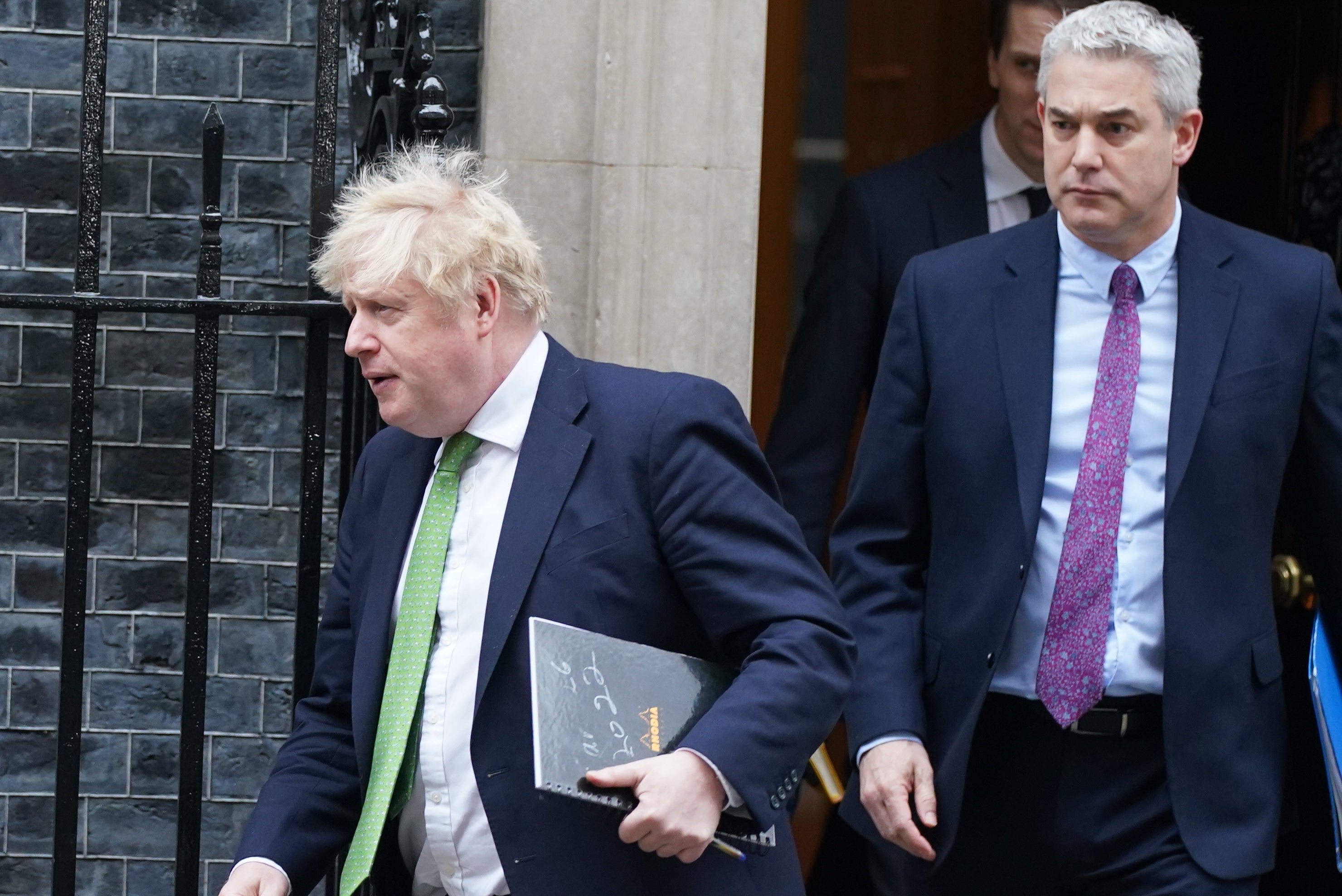 Boris Johnson and Steve Barclay leave Downing Street (Stefan Rousseau/PA)