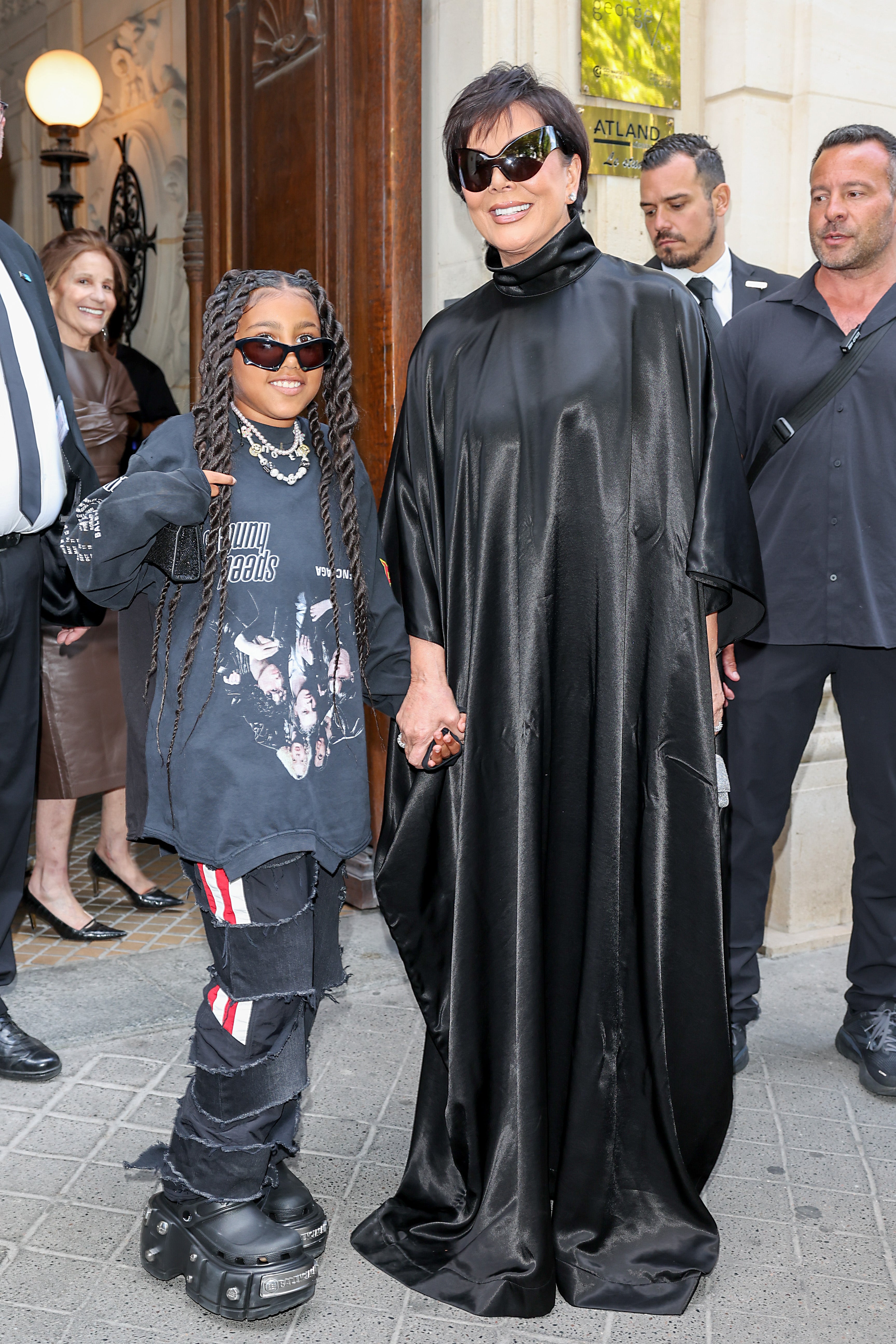 North West and Kris Jenner arrive at Balenciaga on 6 July 2022 in Paris