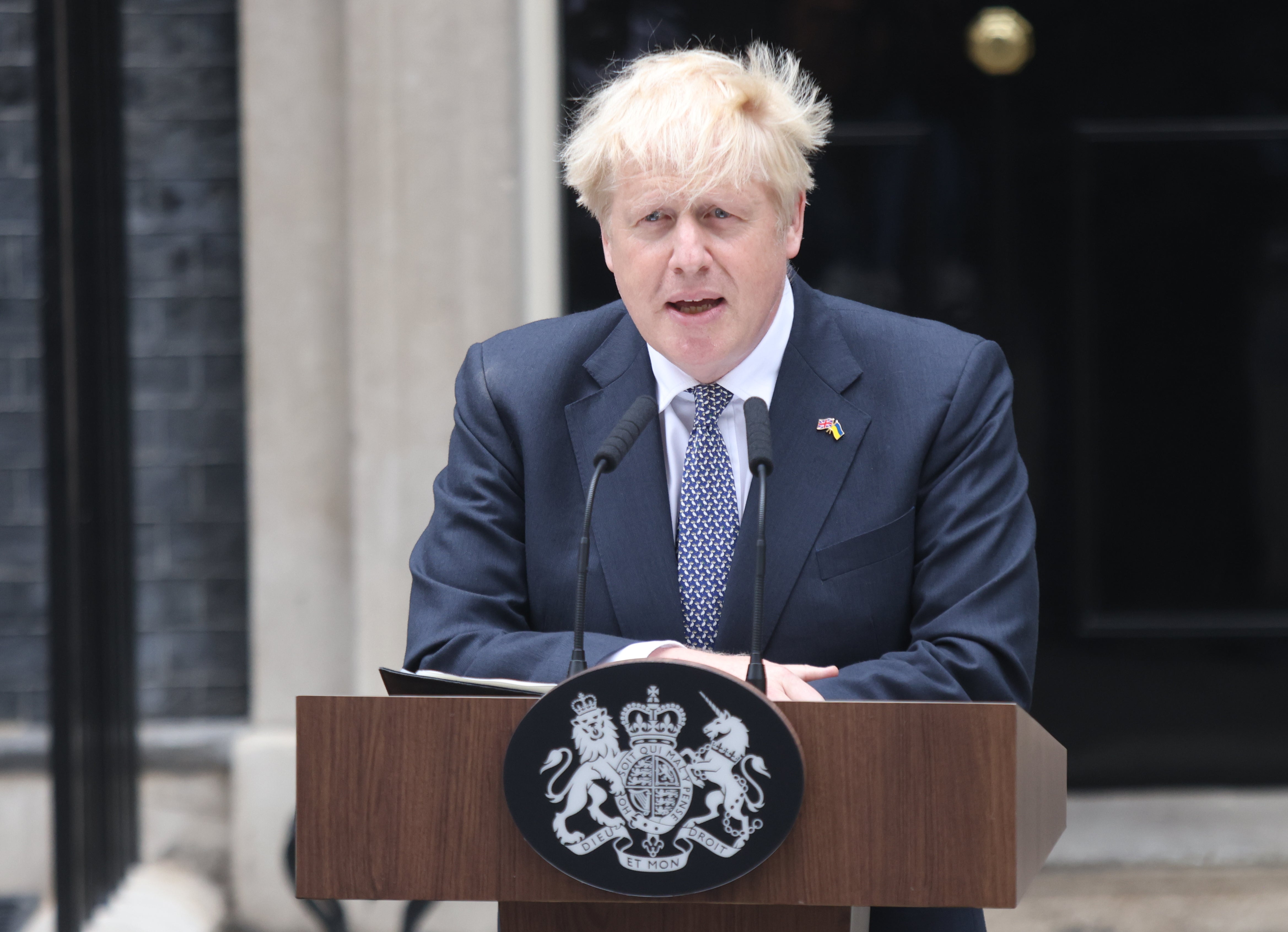 Prime Minister Boris Johnson reads a statement outside 10 Downing Street (James Manning/PA)