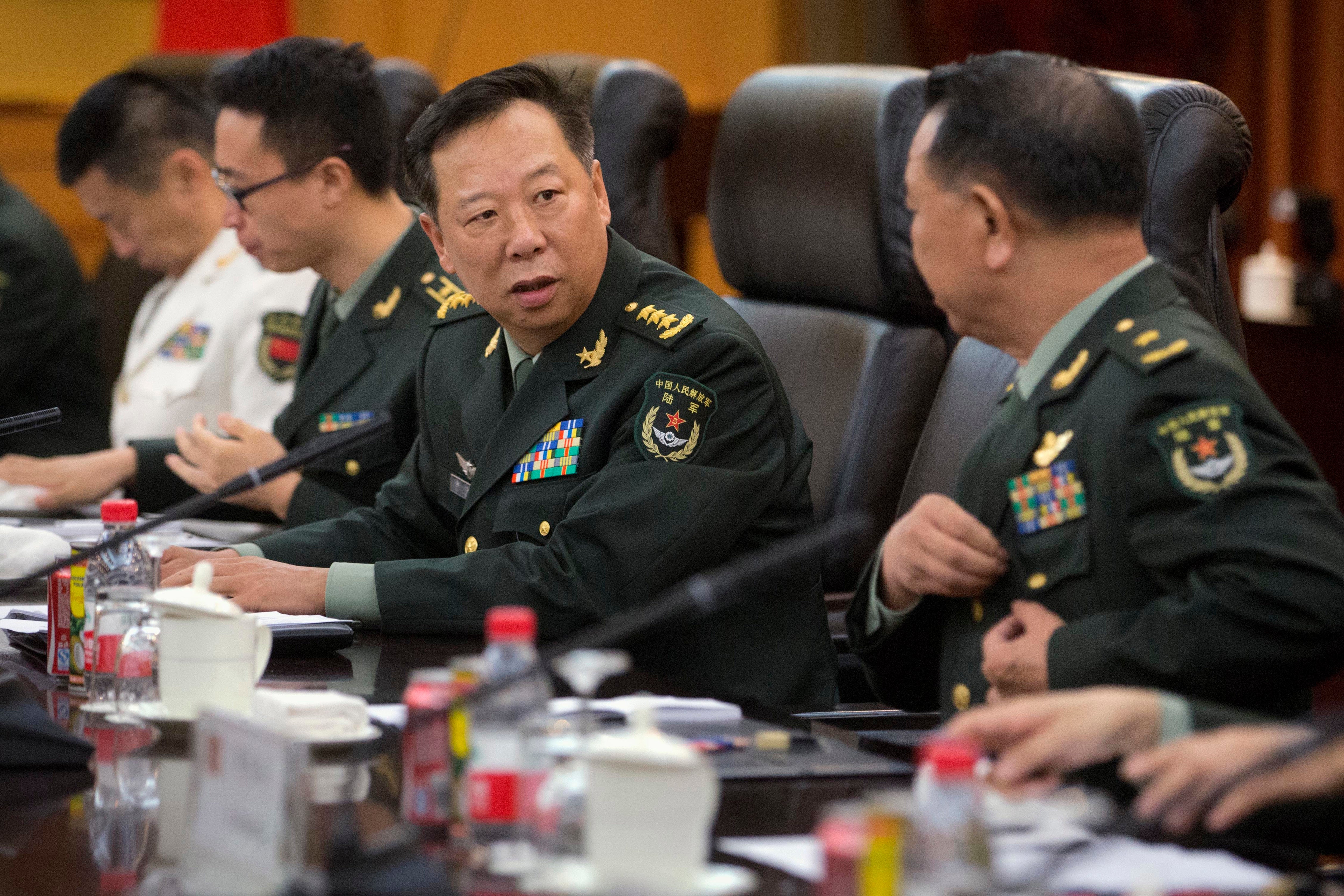 Chinese army General Li Zuocheng (centre) speaks during a meeting with US army chief of staff General Mark Milley, not shown, in Beijing on 16 August 2016