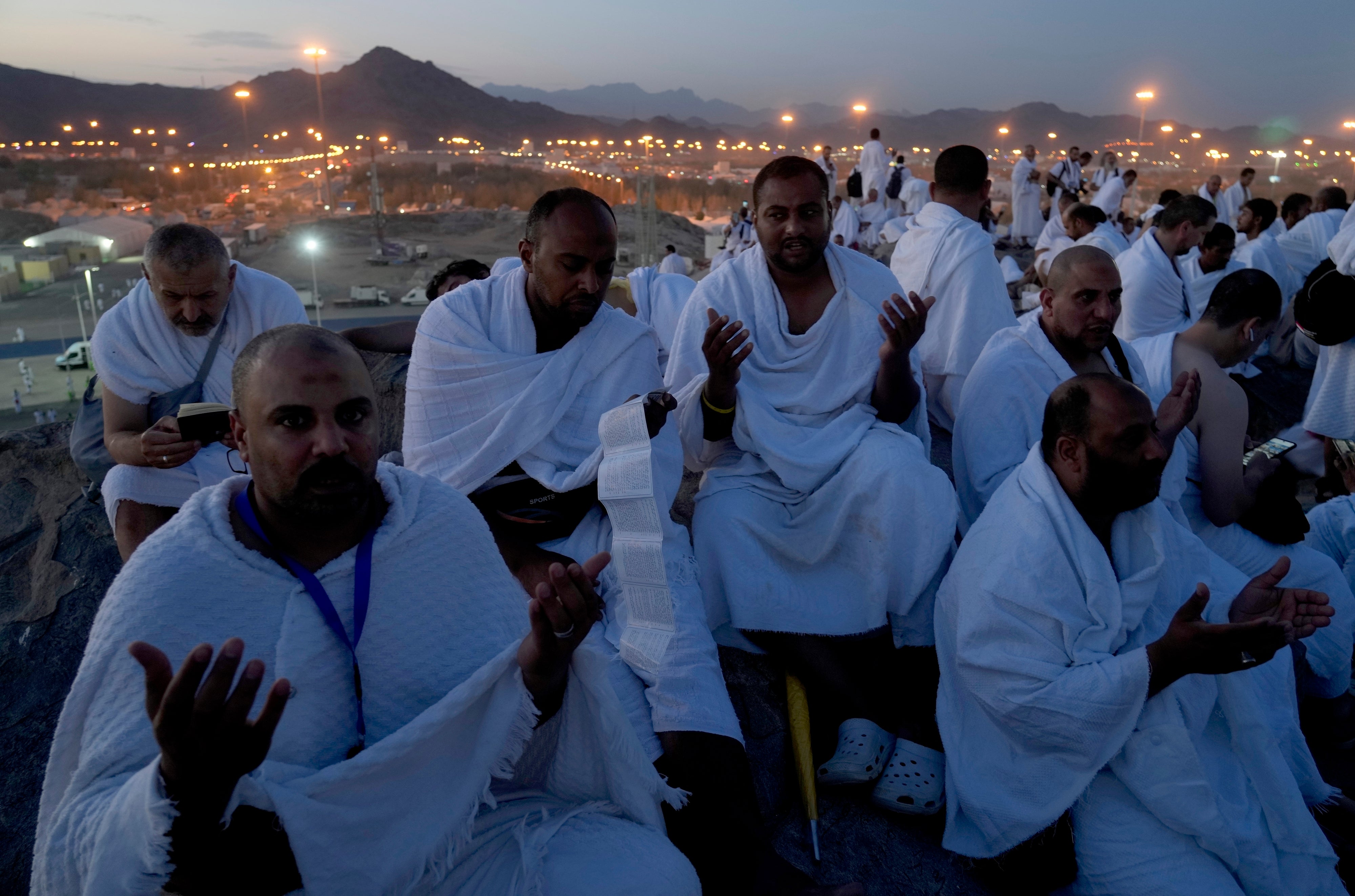 Muslim pilgrims pray on top of the Mountain of Mercy on 8 July 2022 during Hajj