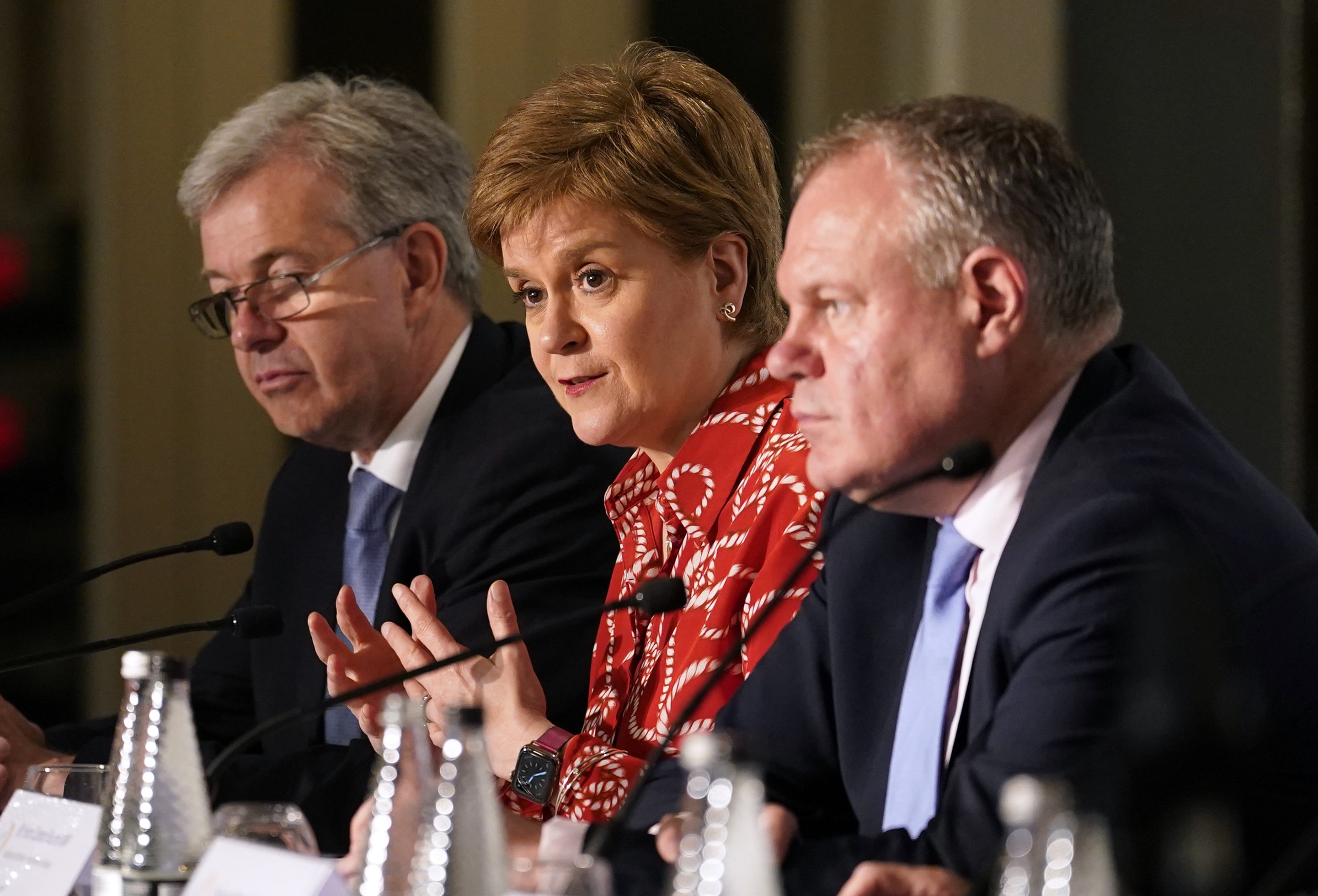 From left to right, chief minister of Jersey, John Le Fondre; Scottish First Minister Nicola Sturgeon and Minister of State for Northern Ireland Conor Burns (Andrew Matthews/PA)