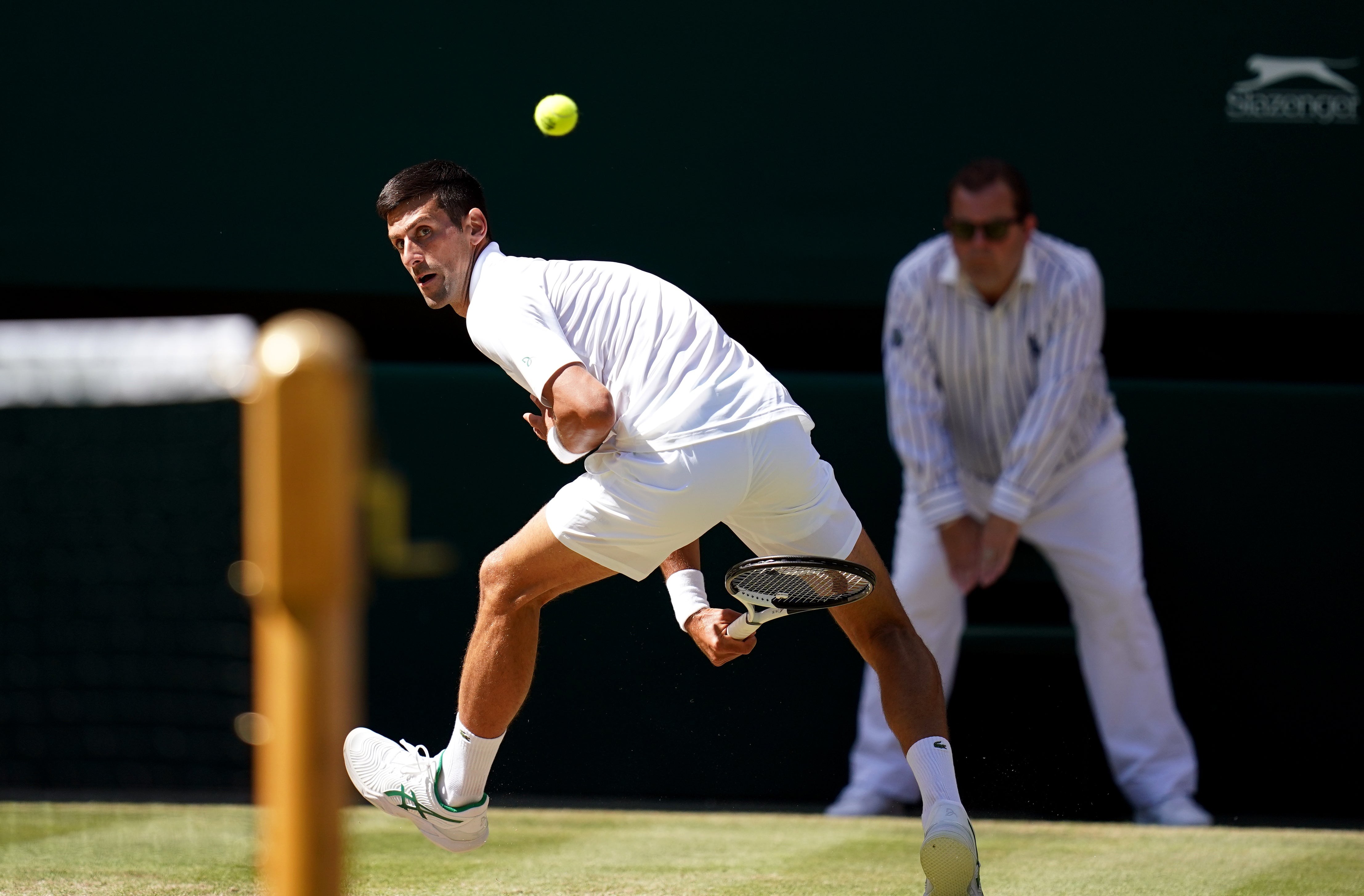 Djokovic produced a stunning shot to win a point (John Walton/PA)