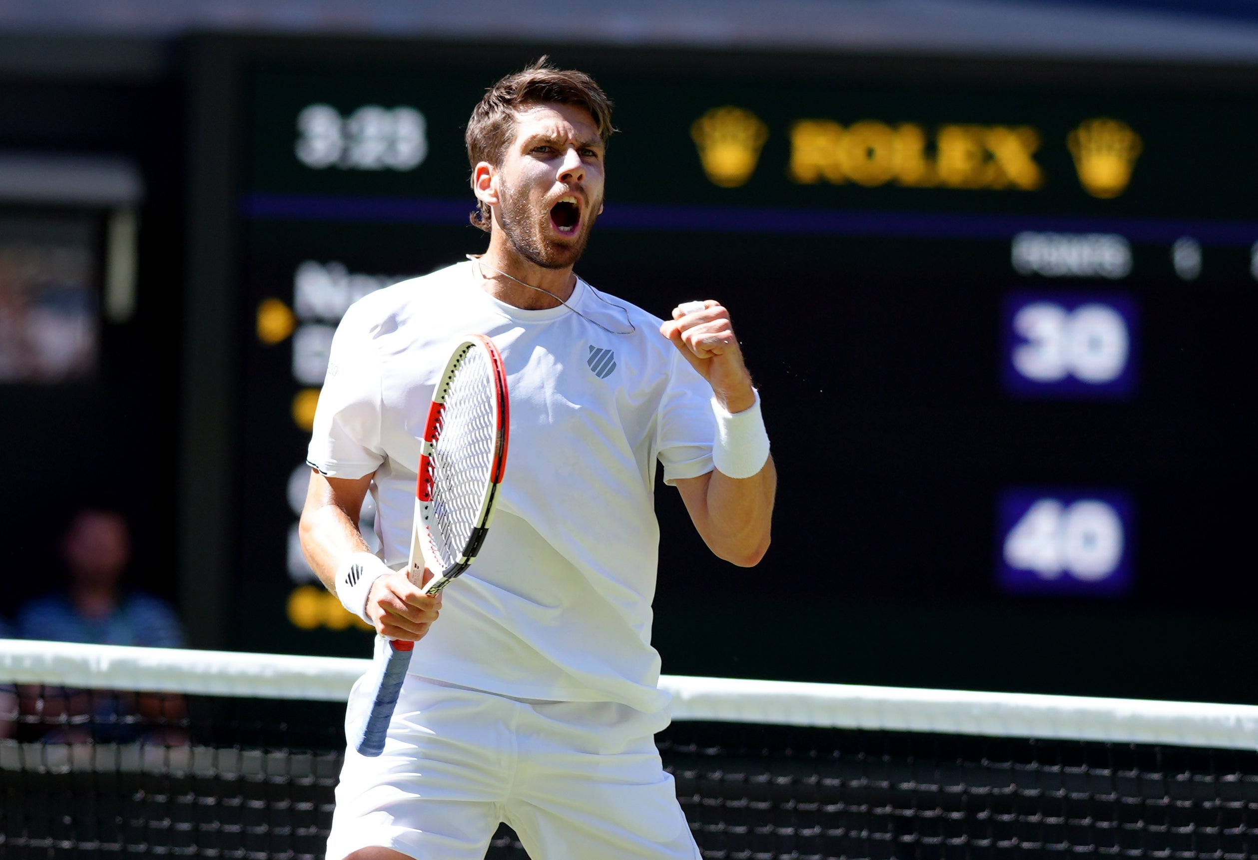 Cameron Norrie celebrates breaking serve in the first game (John Walton/PA)