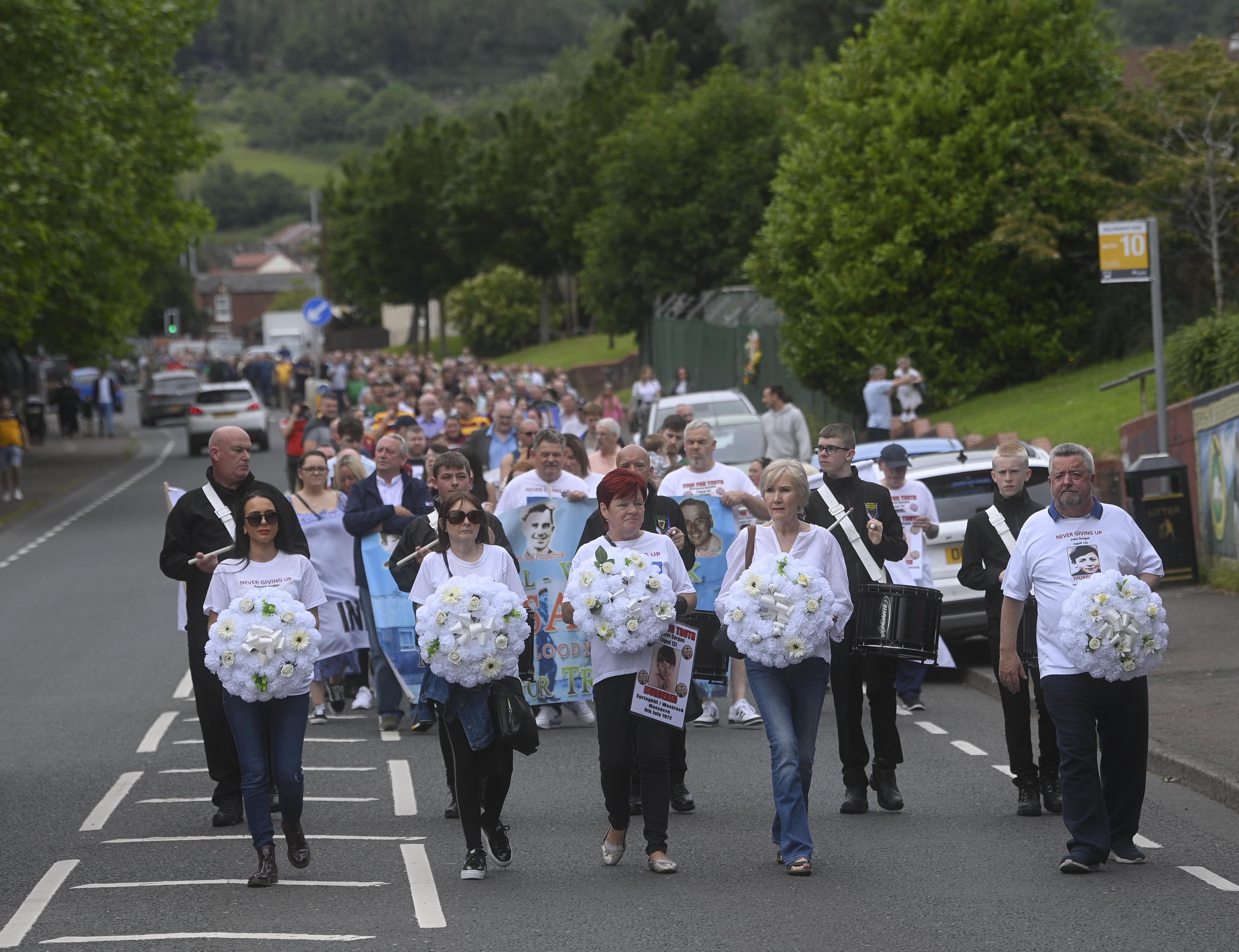 A large crowd attends a march to mark the 50th anniversary of the shooting dead of five people in Springhill, west Belfast. Picture date: Saturday July 9, 2022.