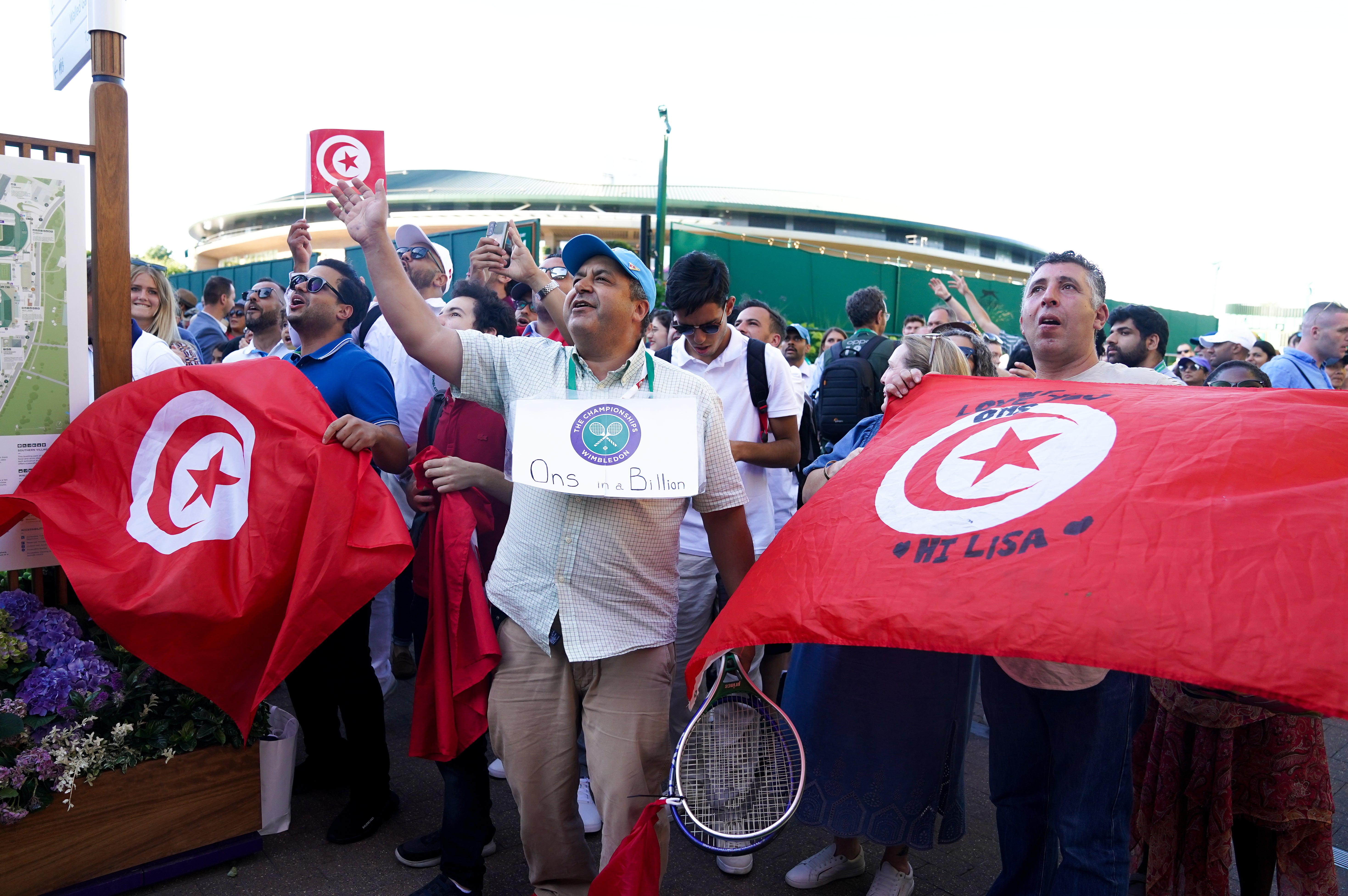 Ons Jabeur supporters show their appreciation for the beaten finalist (Adam Davy/PA)