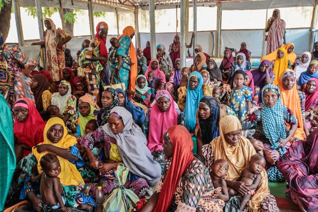 <p>Mothers with malnourished children wait to be tended to at the Ambulatory Therapeutic Feeding Center in Katsina, Nigeria</p>