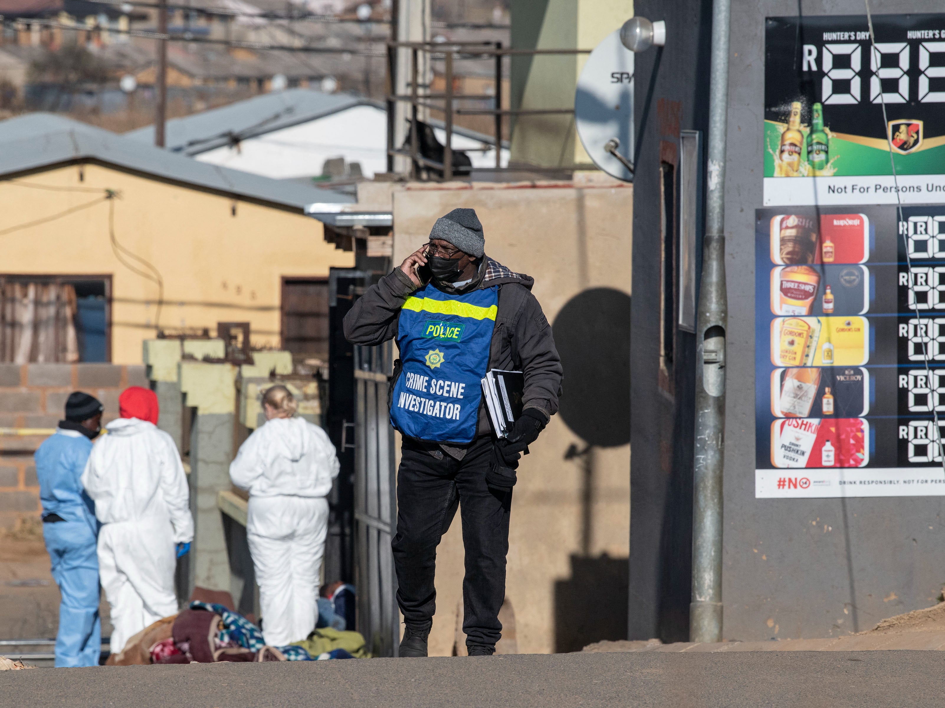 At least 15 people have died after gunmen opened fire at a bar in the South African township of Soweto