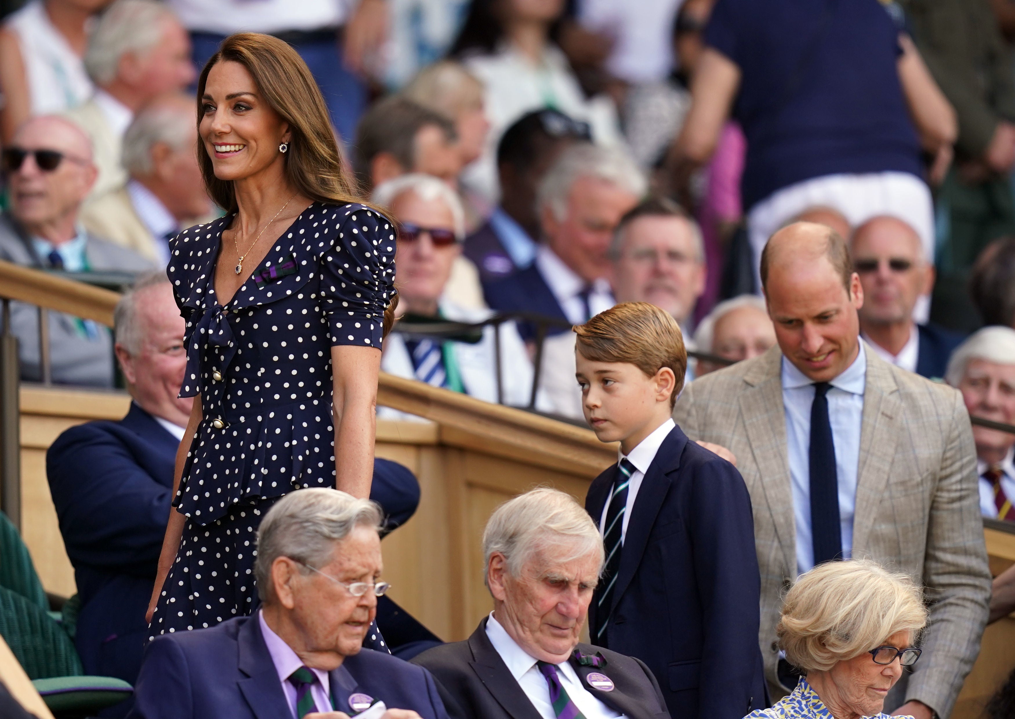 The family arrived all wearing items of navy blue clothing