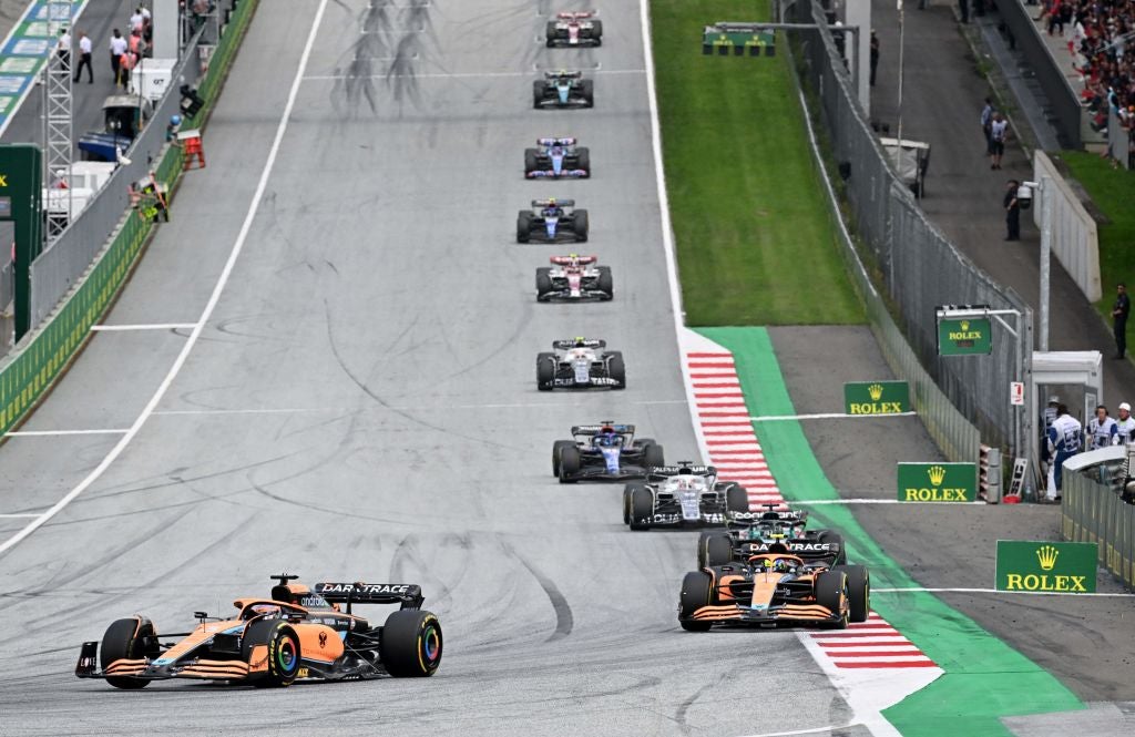 McLaren’s Australian driver Daniel Ricciardo (left) drives on the Red Bull Ring racetrack in Spielberg, Austria, during the F1 Austrian Grand Prix