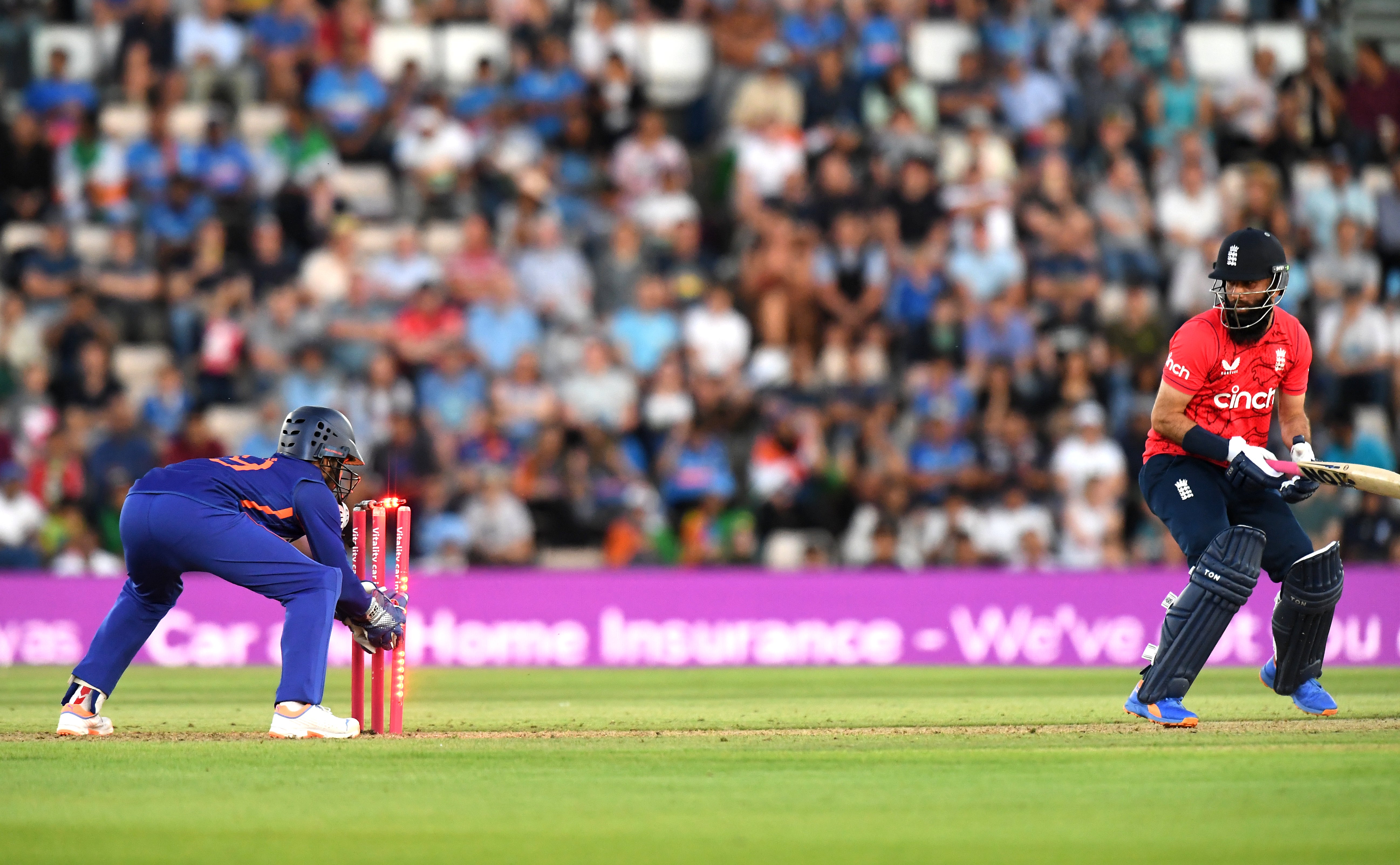 India’s Dinesh Karthik, left, runs out England’s Moeen Ali (Mark Pain/PA)