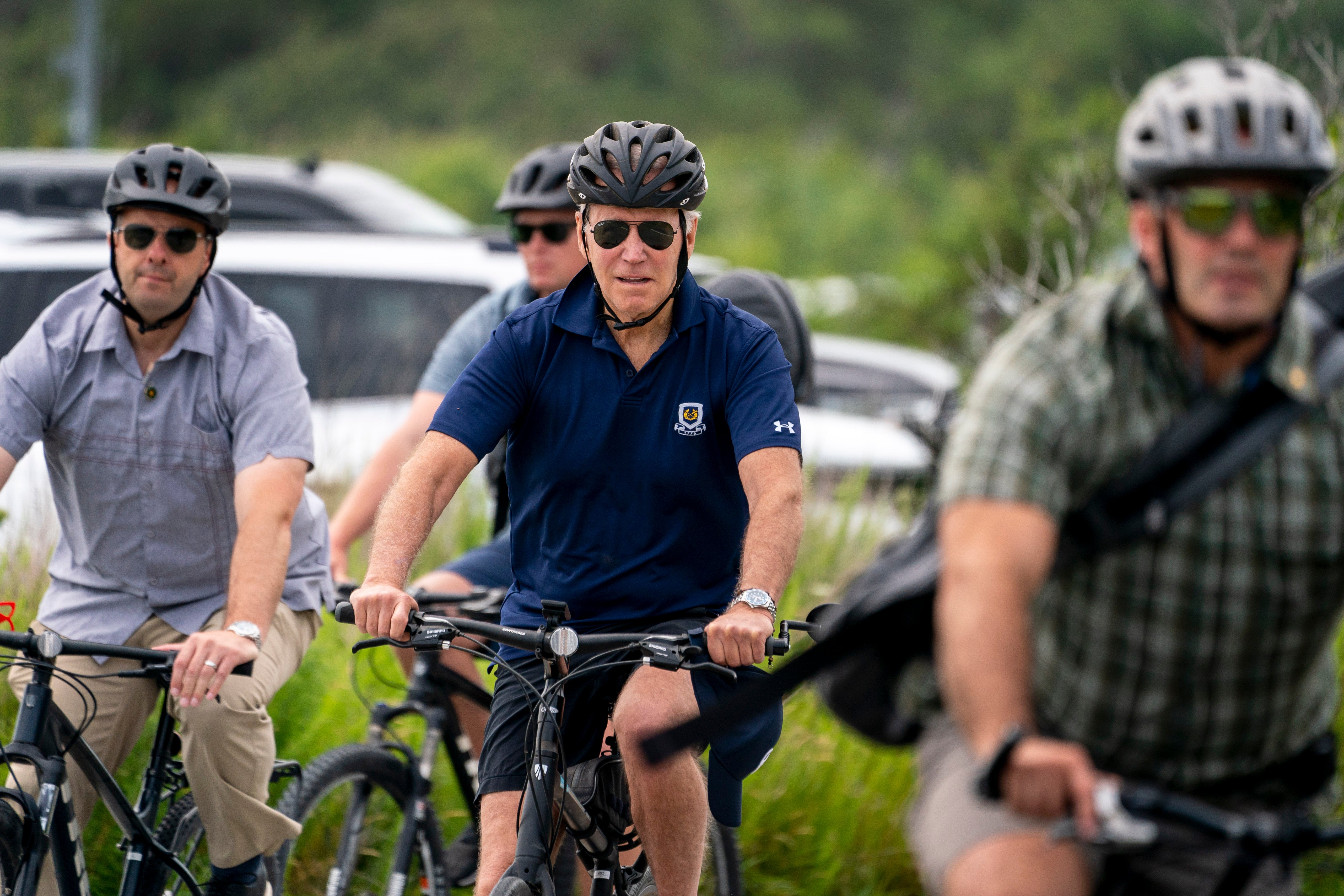 President Joe Biden goes on a bike ride in Gordons Pond State Park in Rehoboth Beach, Del., Sunday, July 10, 2022.