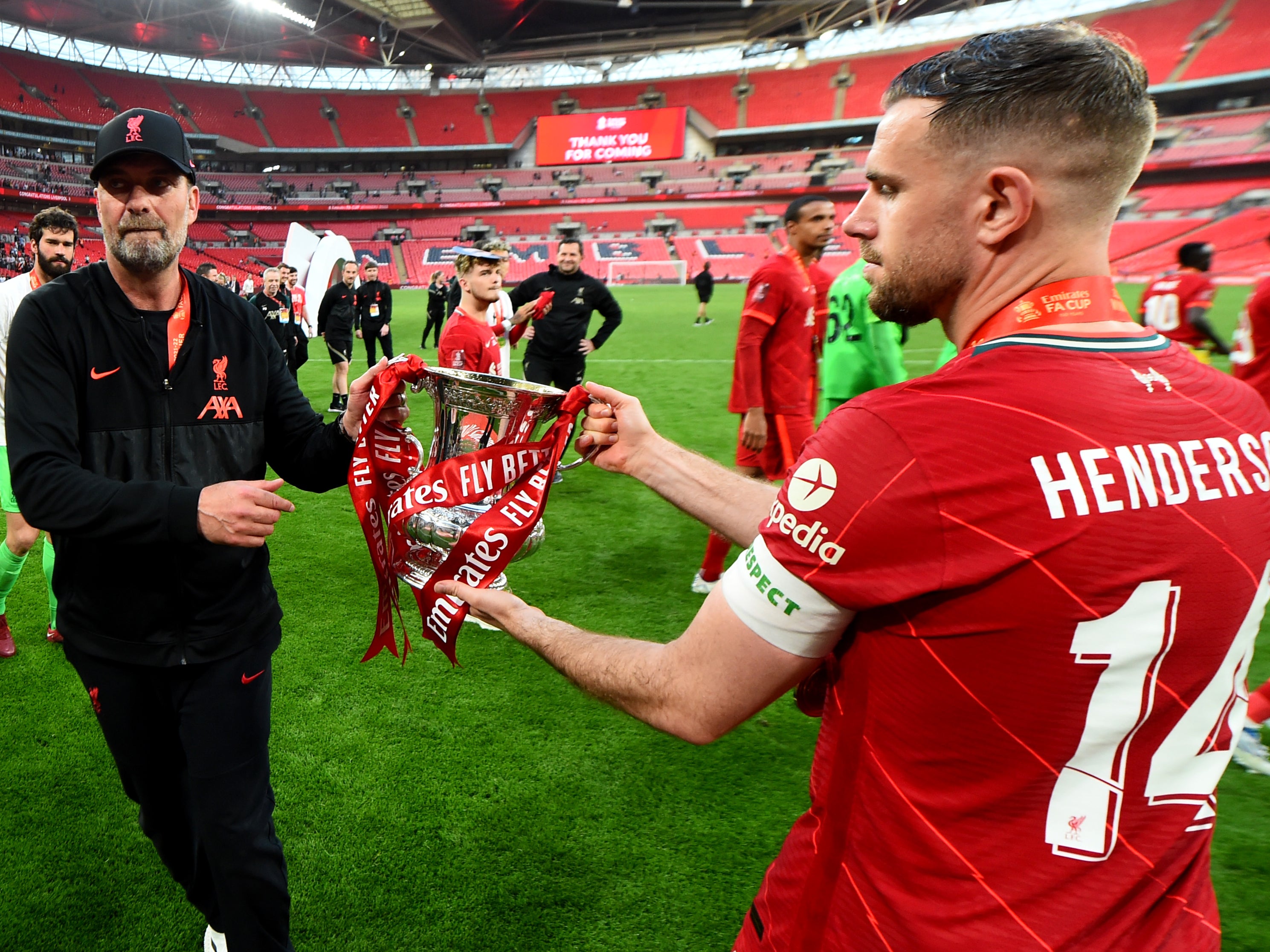 Club captain Jordan Henderson and Jurgen Klopp after Liverpool’s FA Cup final win in May