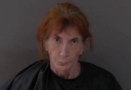 Michele Hoskins, 64, was arrested on Thursday and charged with failing to report the death of her mother and tampering with evidence