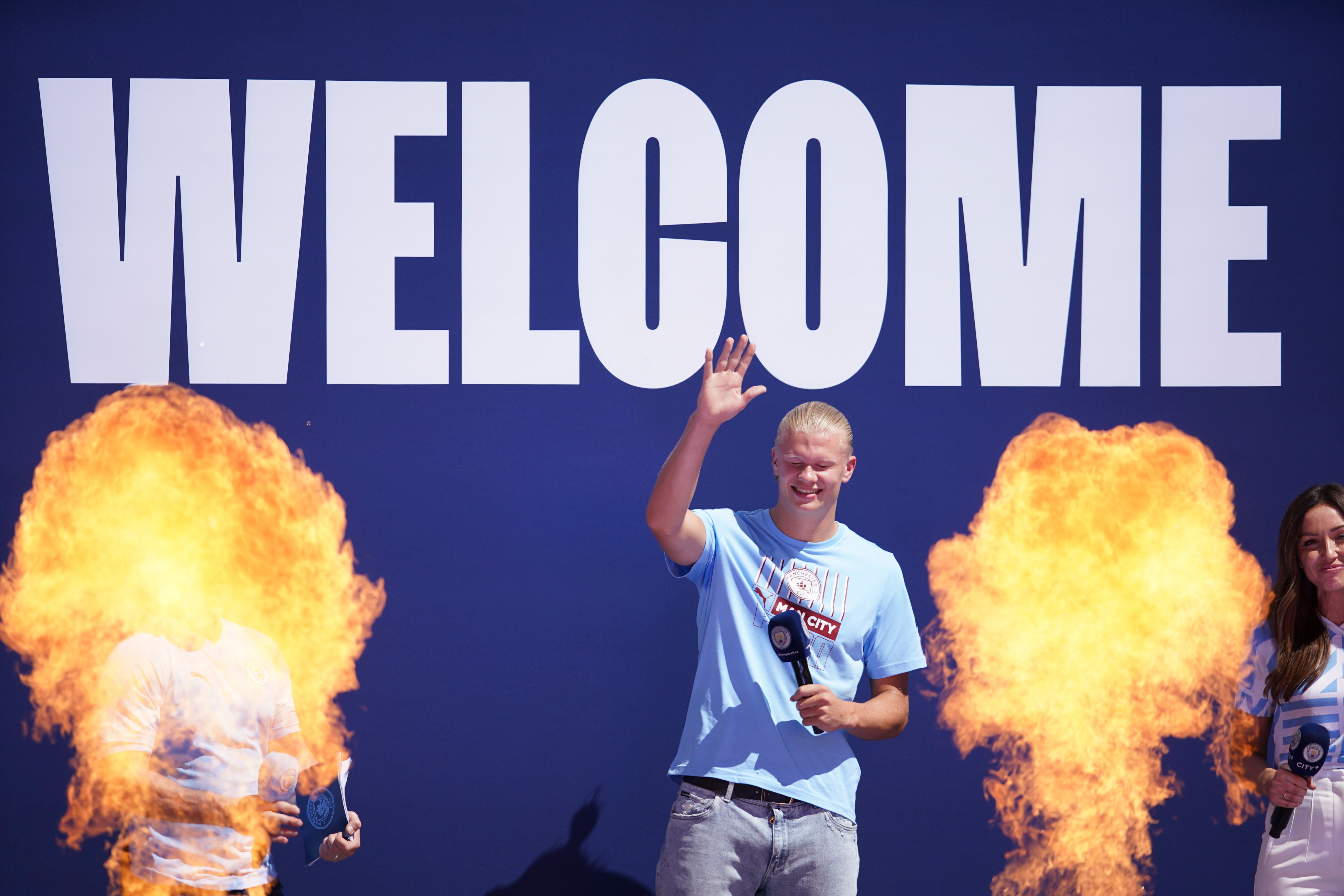 Manchester City's Erling Haaland is cheered by fans