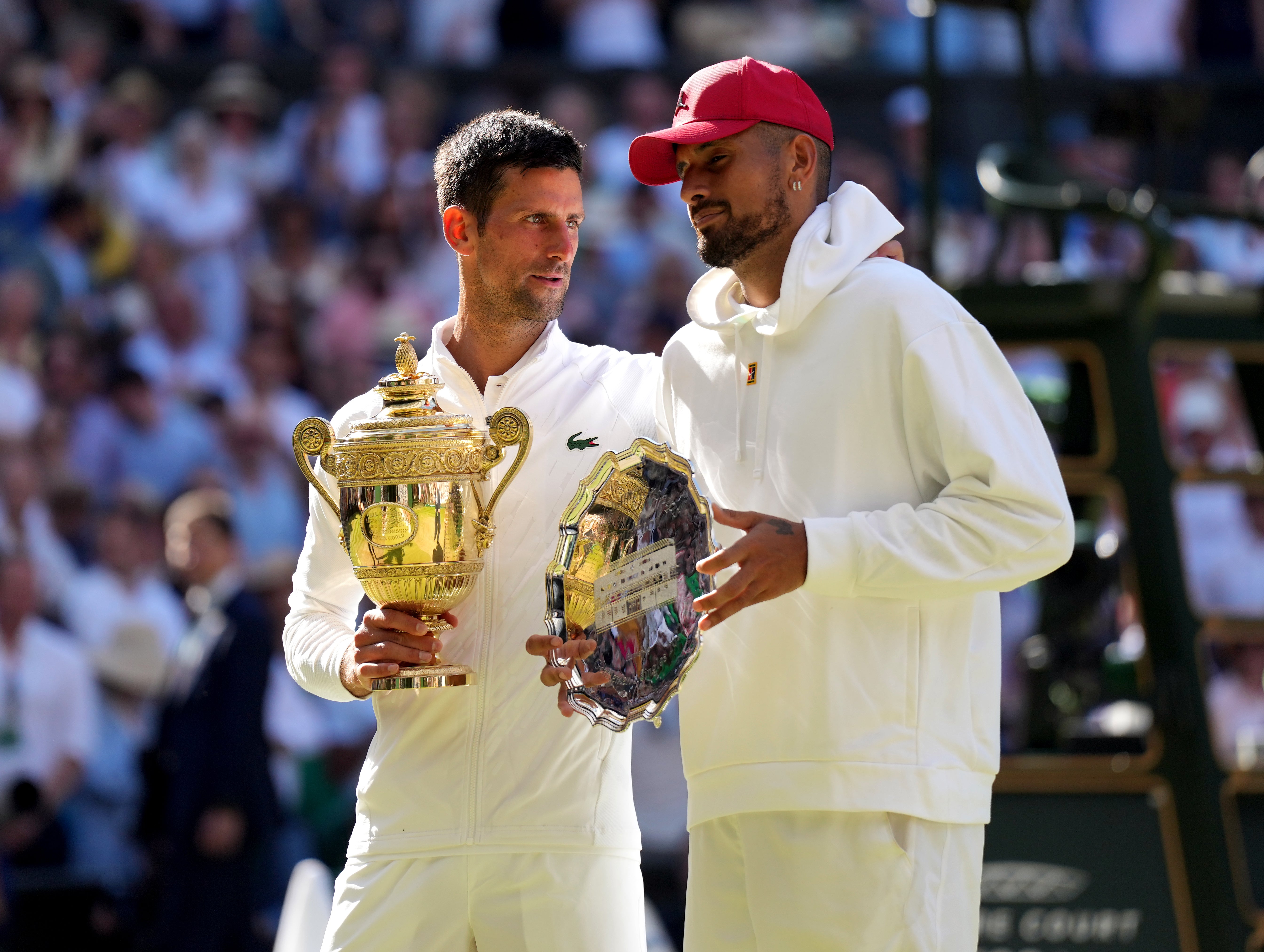 Novak Djokovic (left) beat Nick Kyrgios 4-6 6-3 6-4 7-6 (Zac Goodwin/PA)