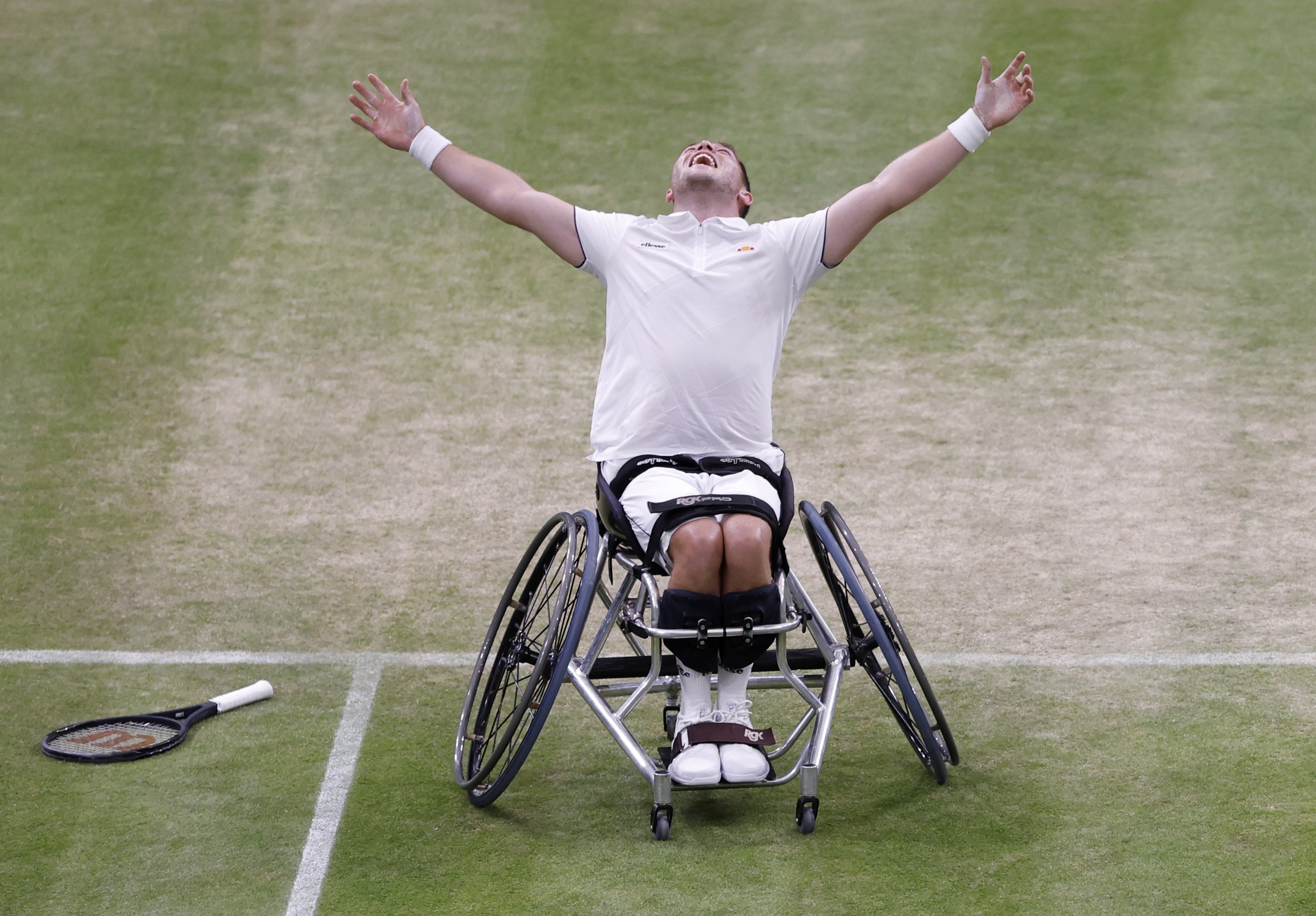 Alfie Hewett celebrates after he and Gordon Reid won a late-night wheelchair doubles thriller on Court One (Steven Paston/PA)