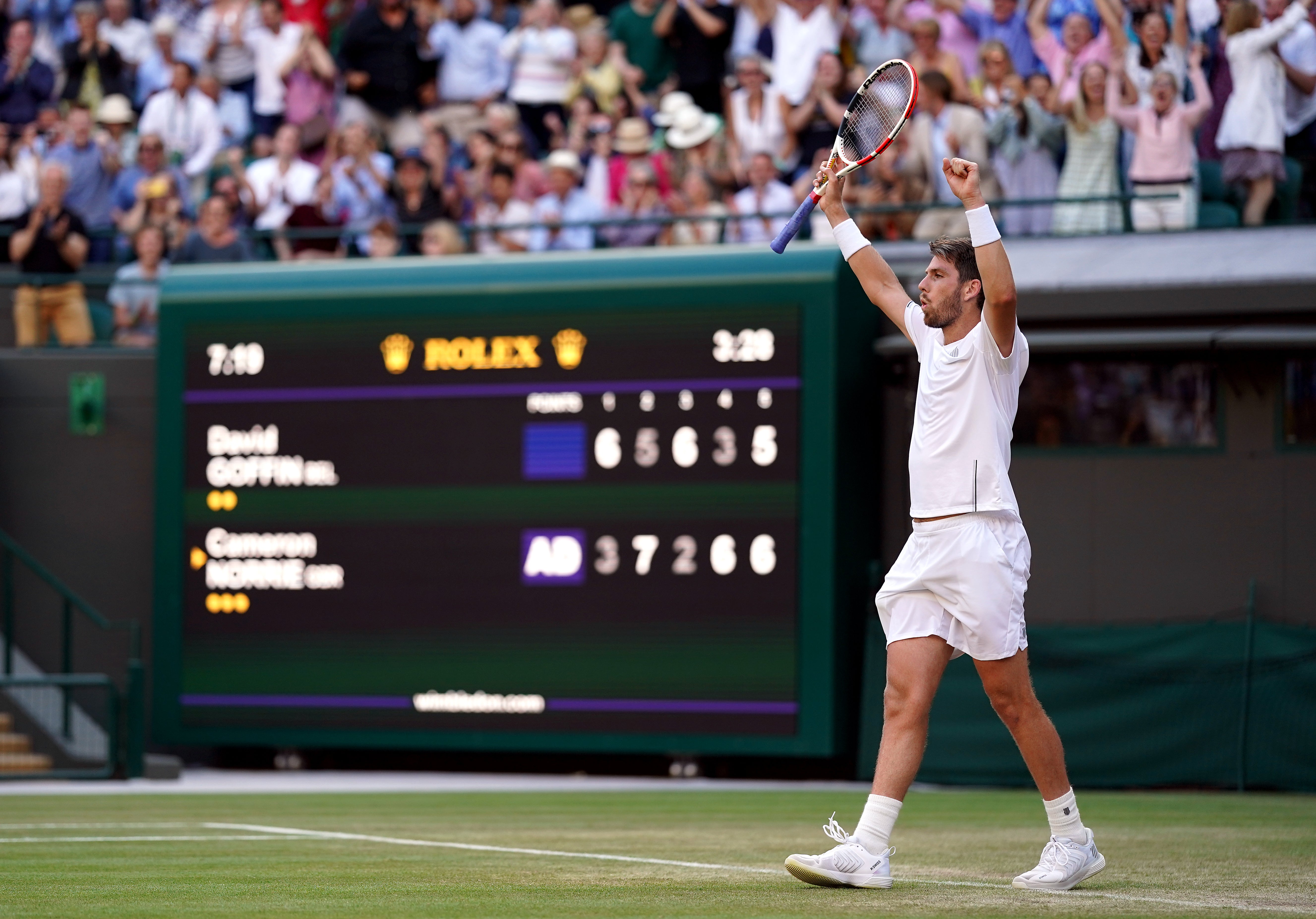 Cameron Norrie celebrates after beating David Goffin to make the last four at Wimbledon for the first time (John Walton/PA)