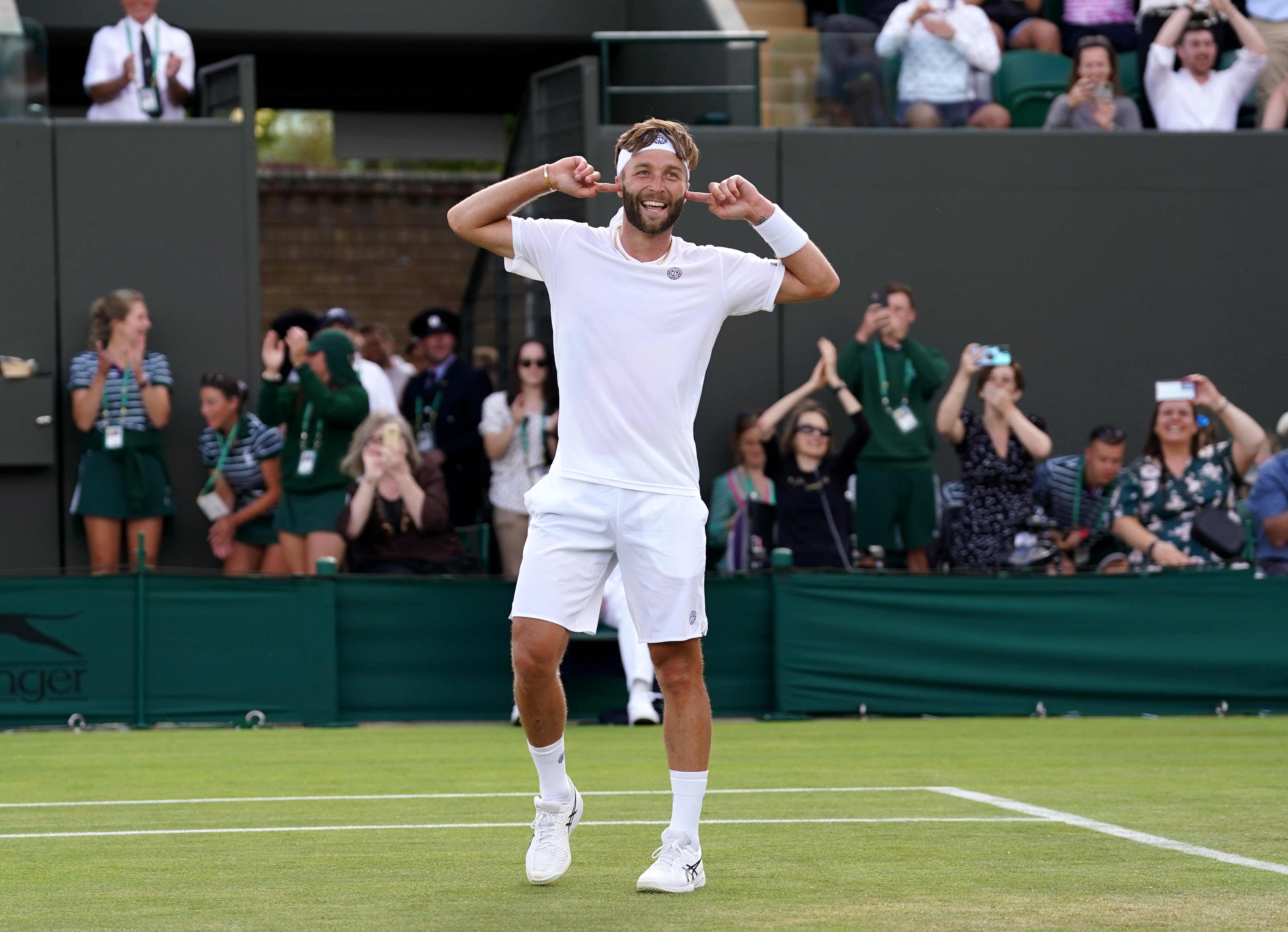 On an impressive day for British players, Liam Broady celebrates beating 12th seed Diego Schwartzman in five sets (Adam Davy/PA)