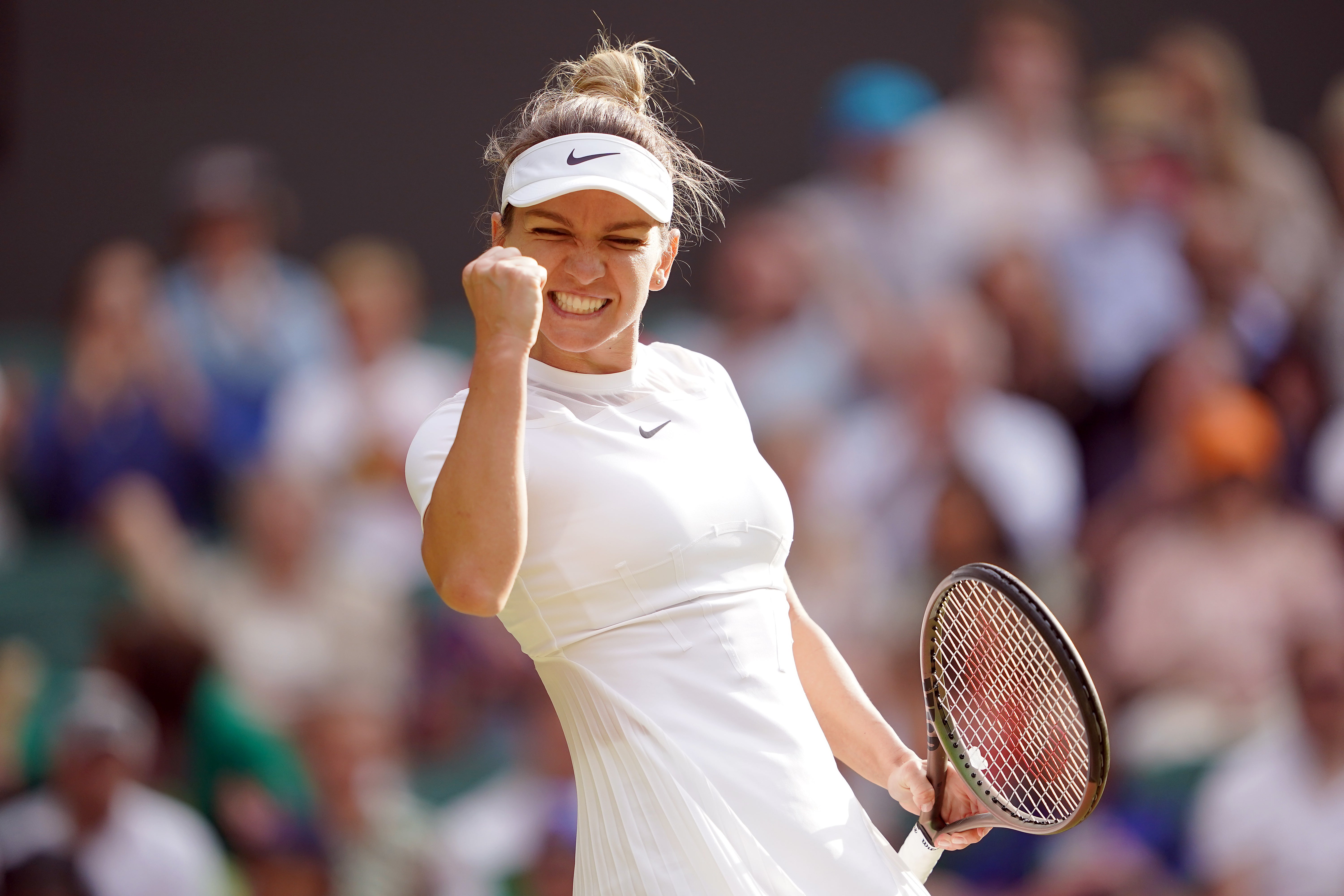 2019 champion Simona Halep eases past fourth seed Paula Badosa (Zac Goodwin/PA)