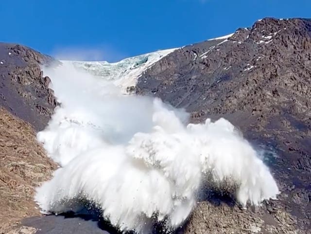 <p>Dramatic footage shows the moment a tourist group were caught in an avalanche in the Tian Shan mountains</p>