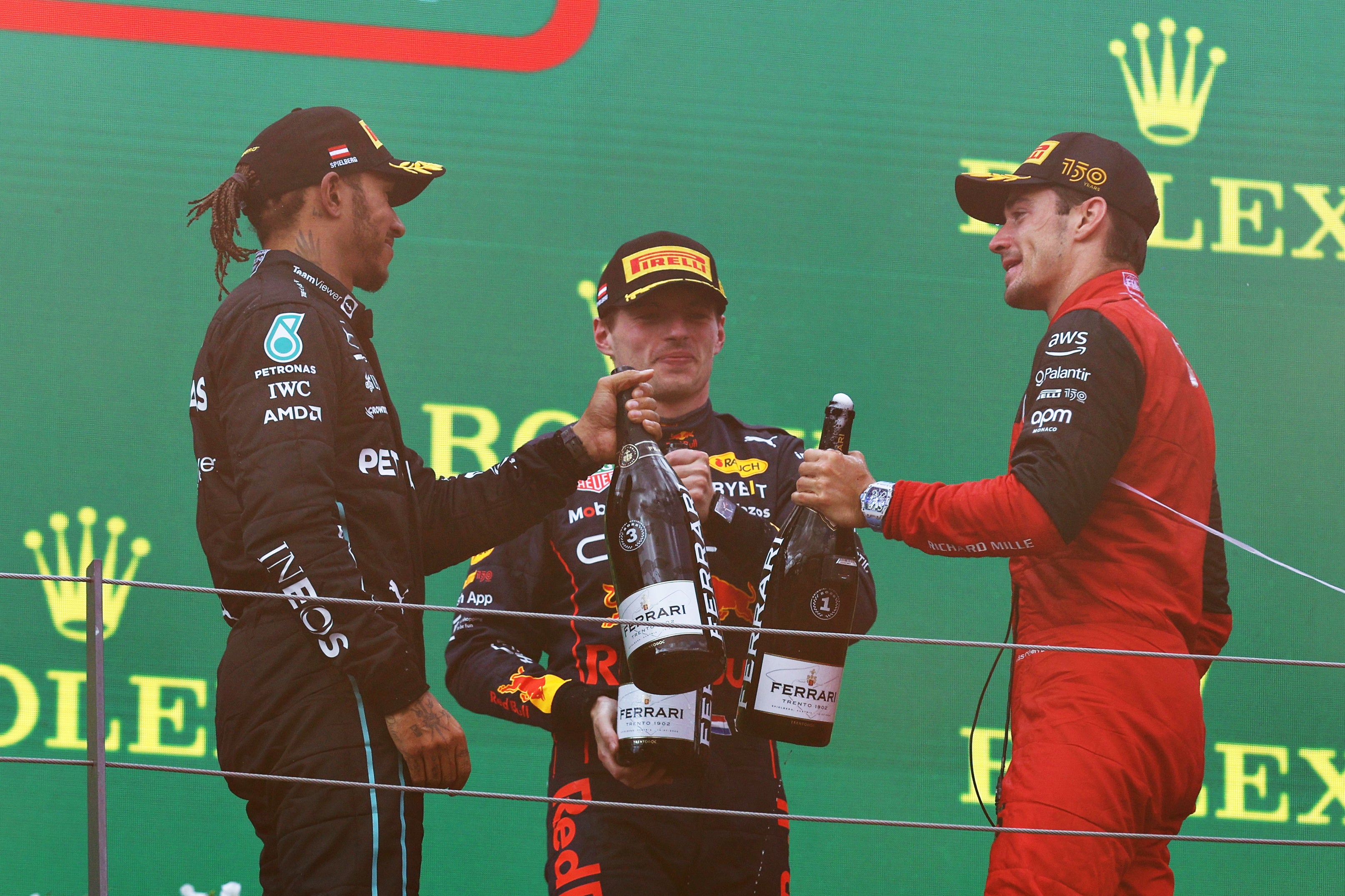 The top three in Austria celebrate on the podium