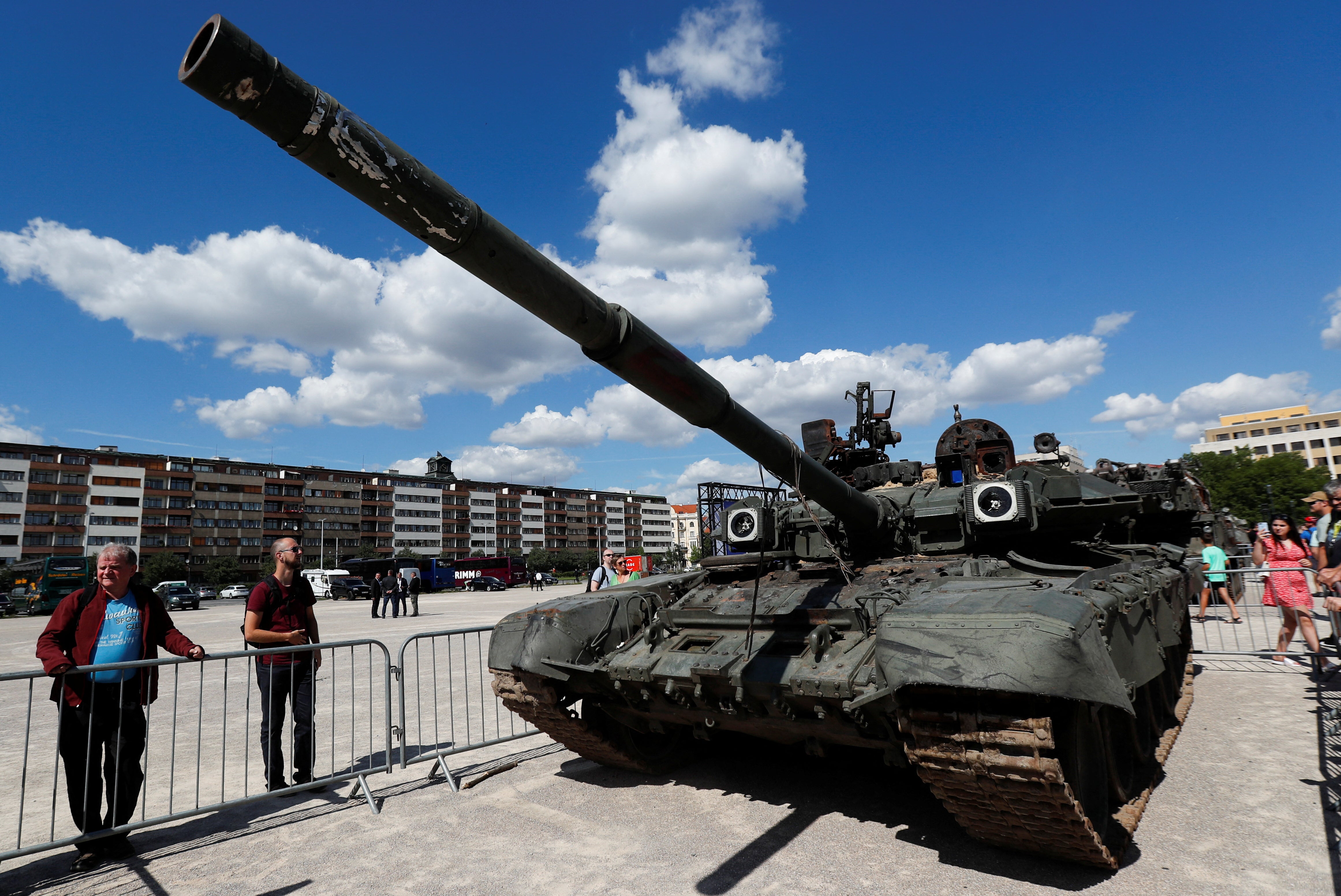 People look at Russian military equipment destroyed by the armed forces of Ukraine displayed in Prague