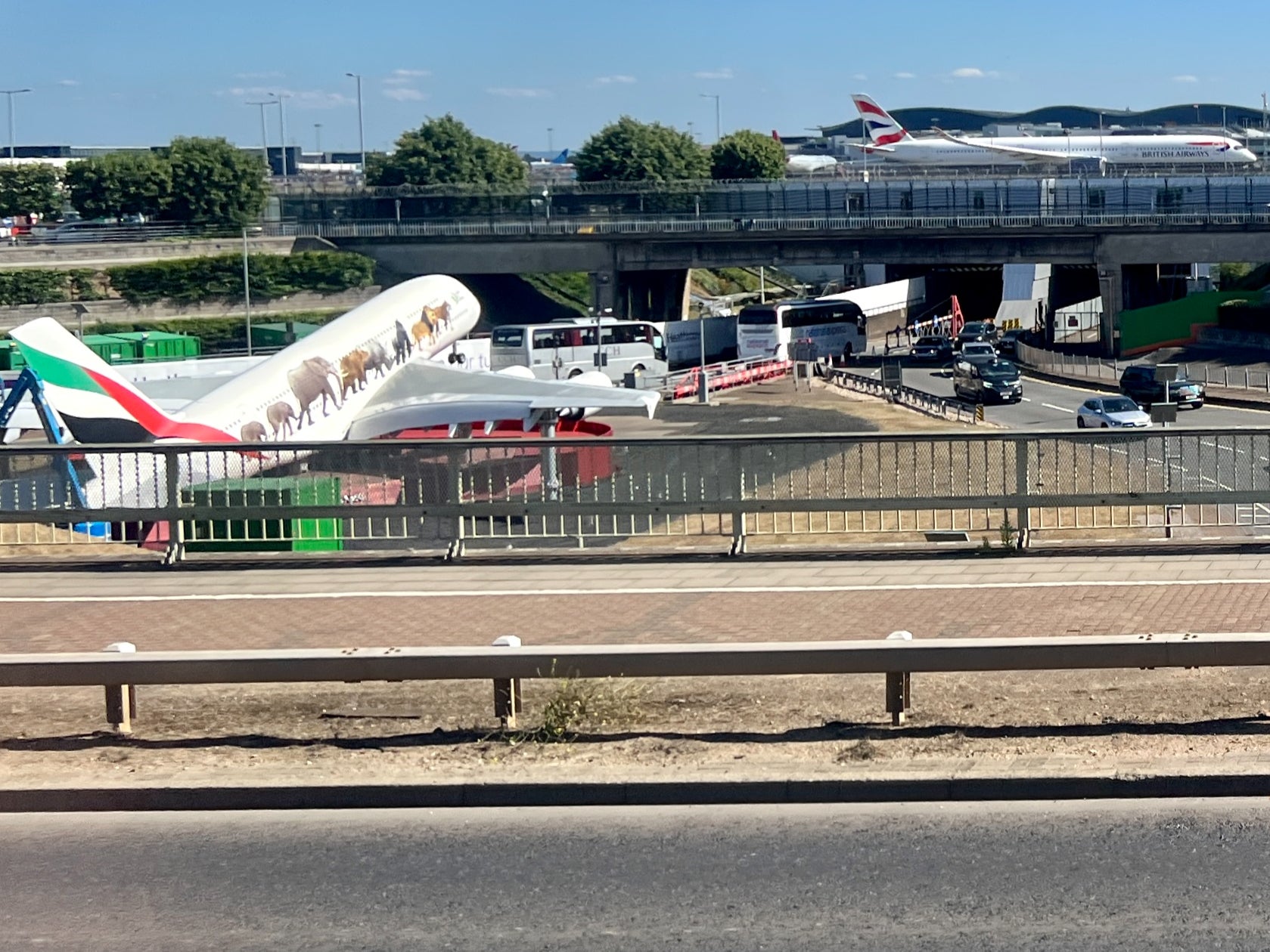 Departing soon? Heathrow airport’s ‘Emirates roundabout’ and a British Airways jet on the northern runway