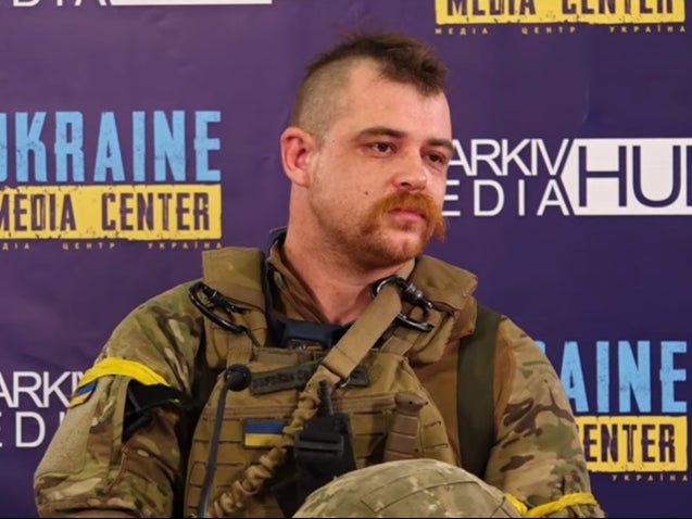 Craig speaking at a press conference in Kharkiv