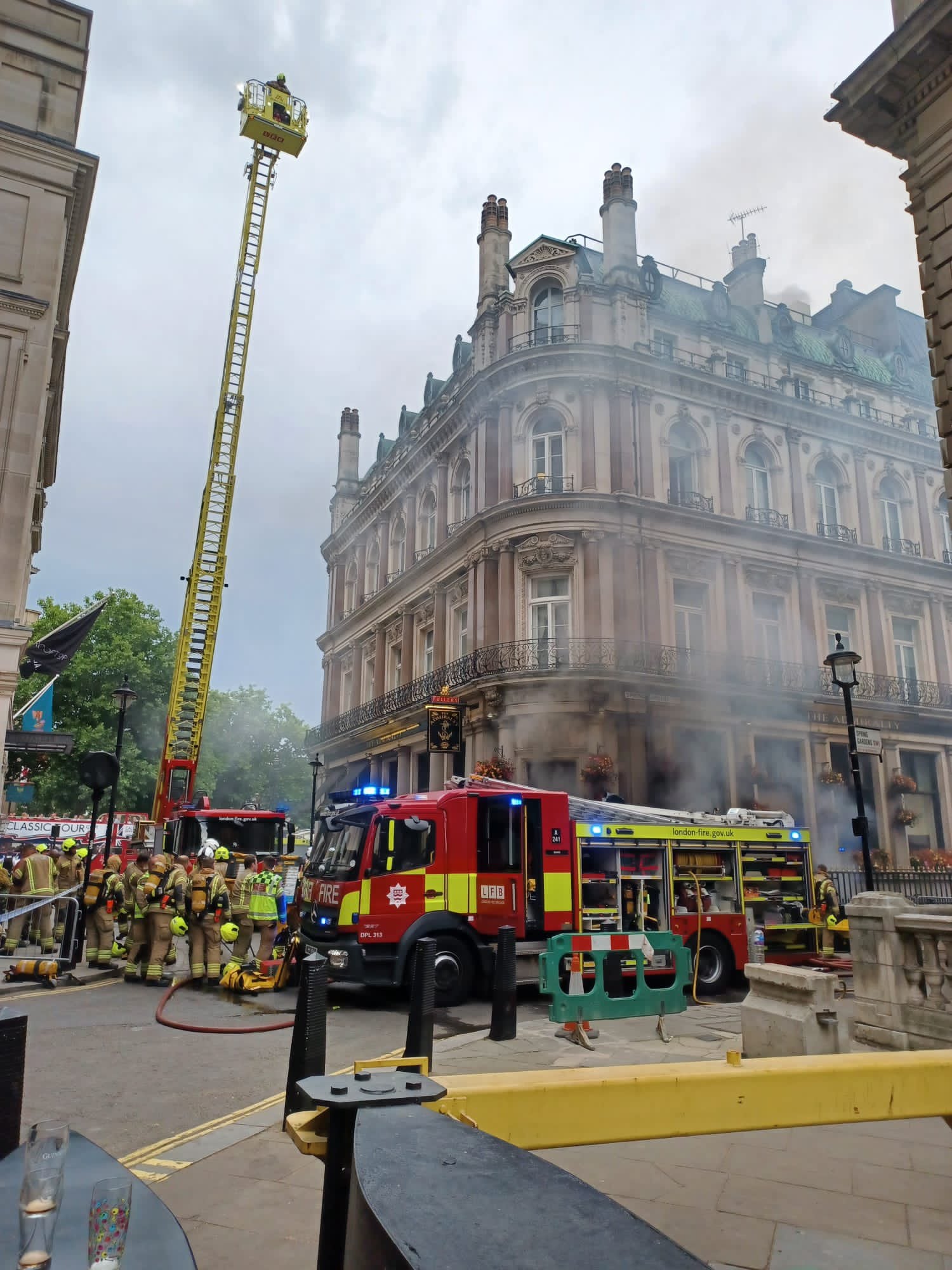 Firefighters tackle blaze on edge of Trafalgar Square