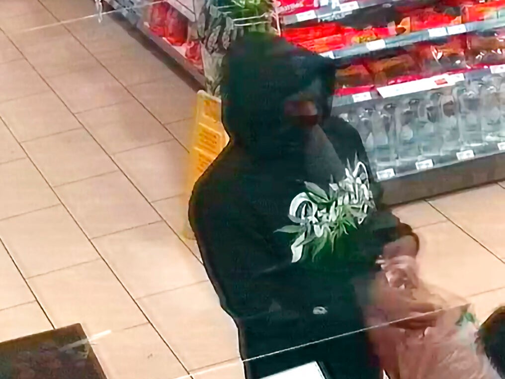 In this image from a 7-Eleven store in Upland, California released by the Upland Police Department is a person police are attempting to identify in connection with two people who were killed and three who were wounded in shootings at four 7-Eleven locations