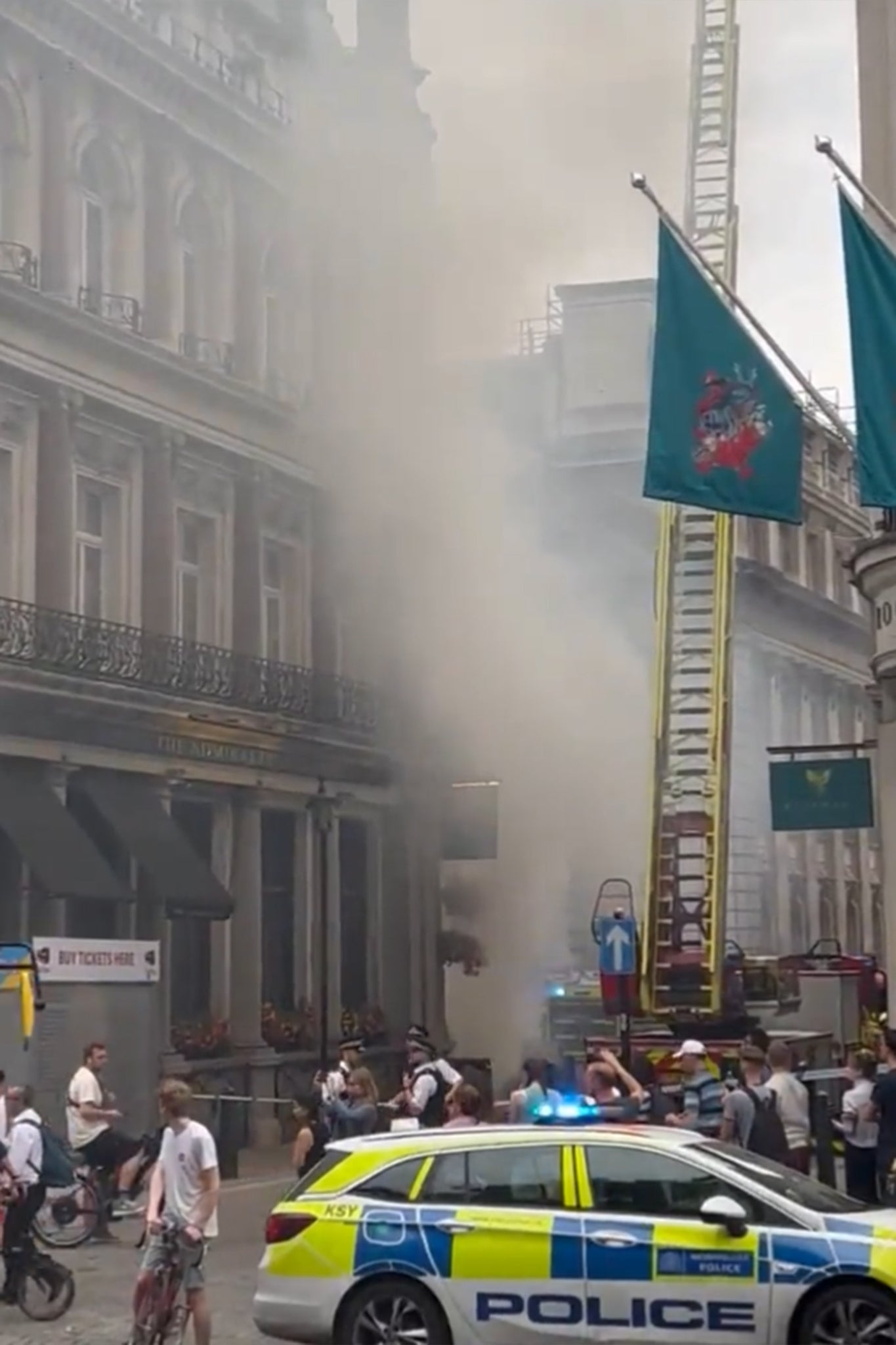 Smoke rises high over central London