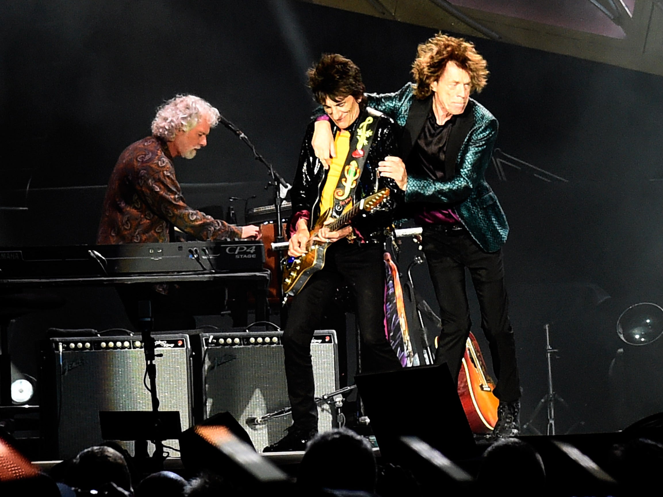 Rolling with the Stones: Leavell, Ronnie Wood and Mick Jagger onstage in Nashville in 2015