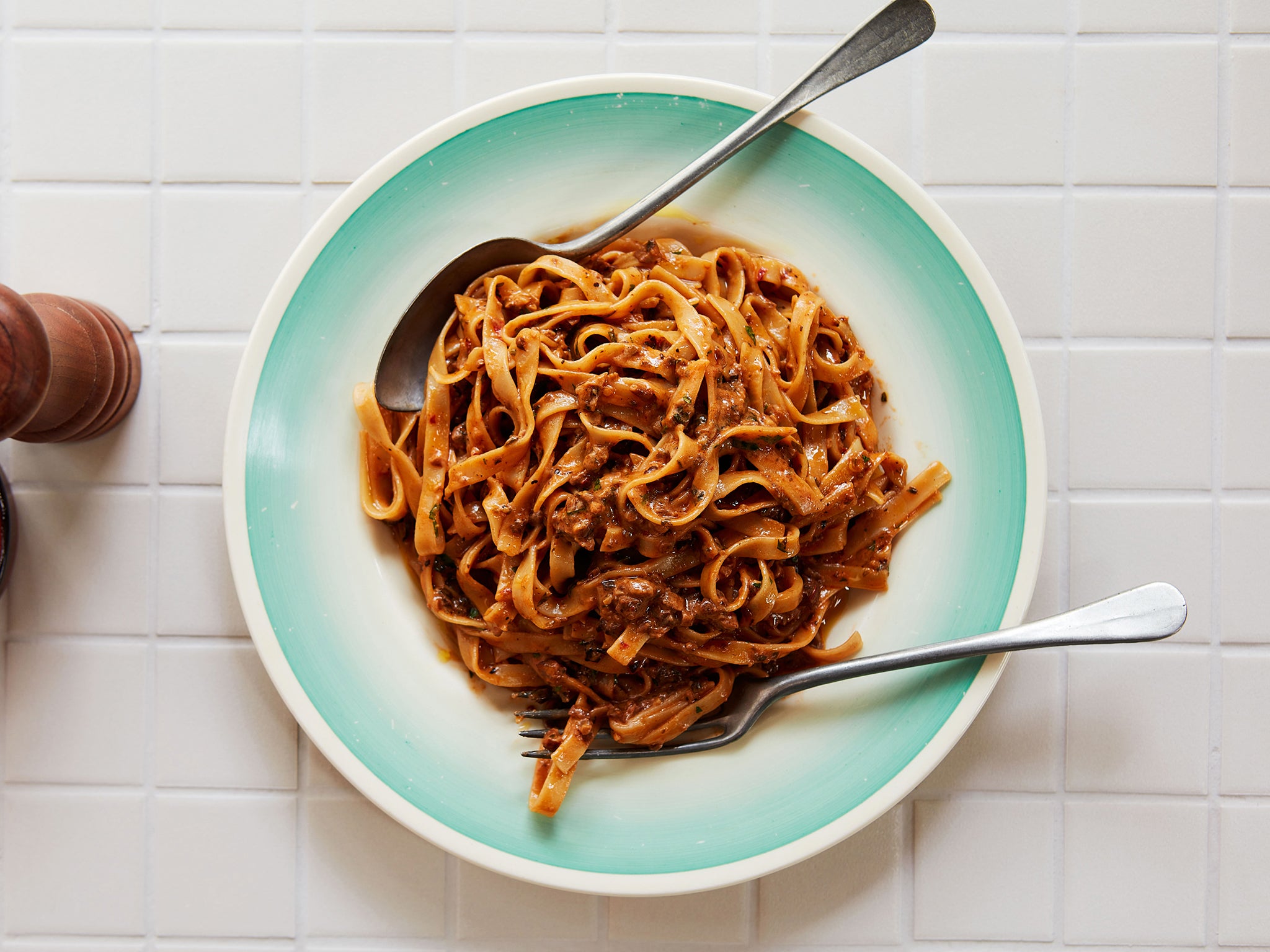 Dried porcini mushrooms give this 10-minute ragu all the intensity of a meat ragu that’s been simmering for hours