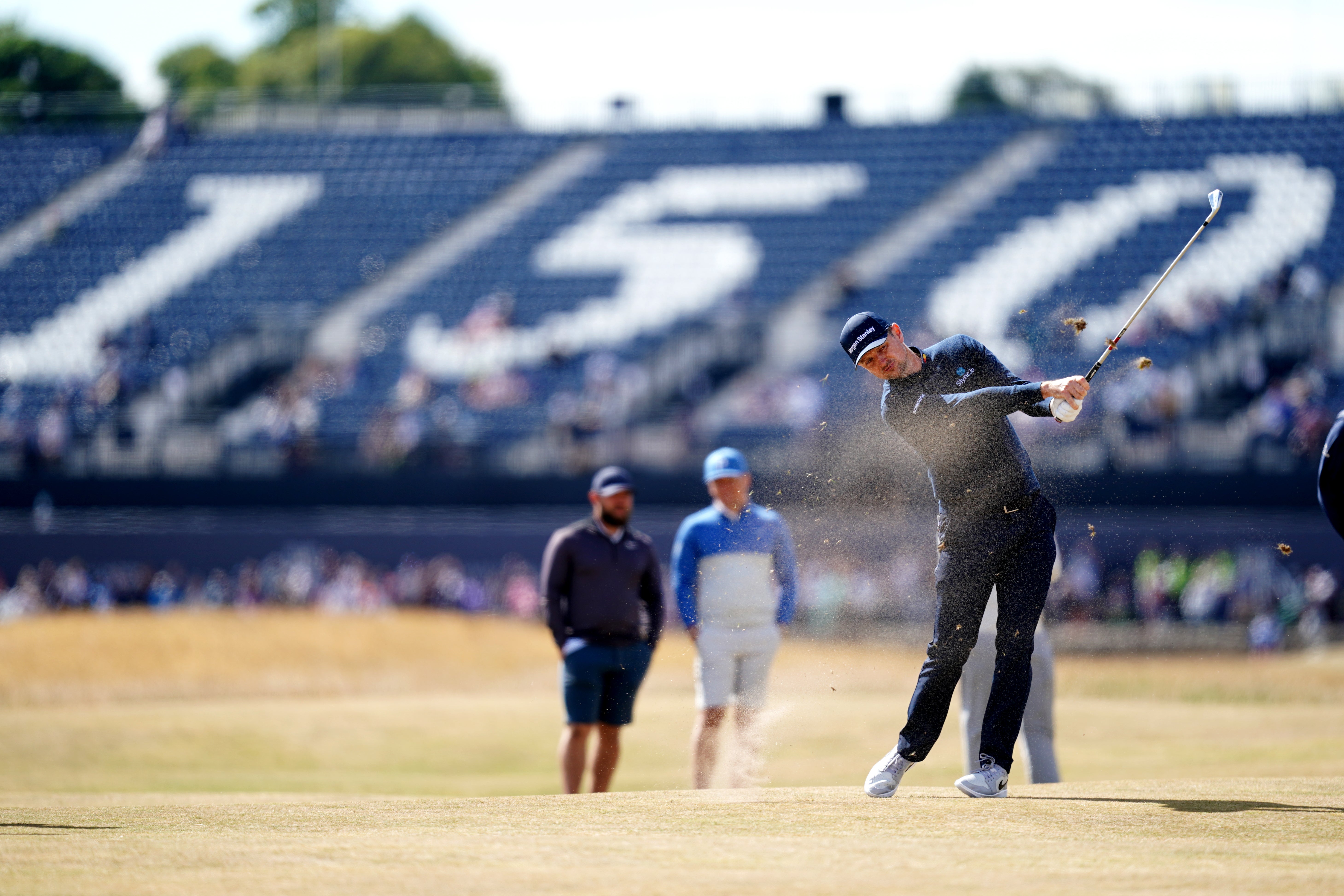 Justin Rose plays from a hard, fast-running fairway at St Andrews (David Davies/PA)