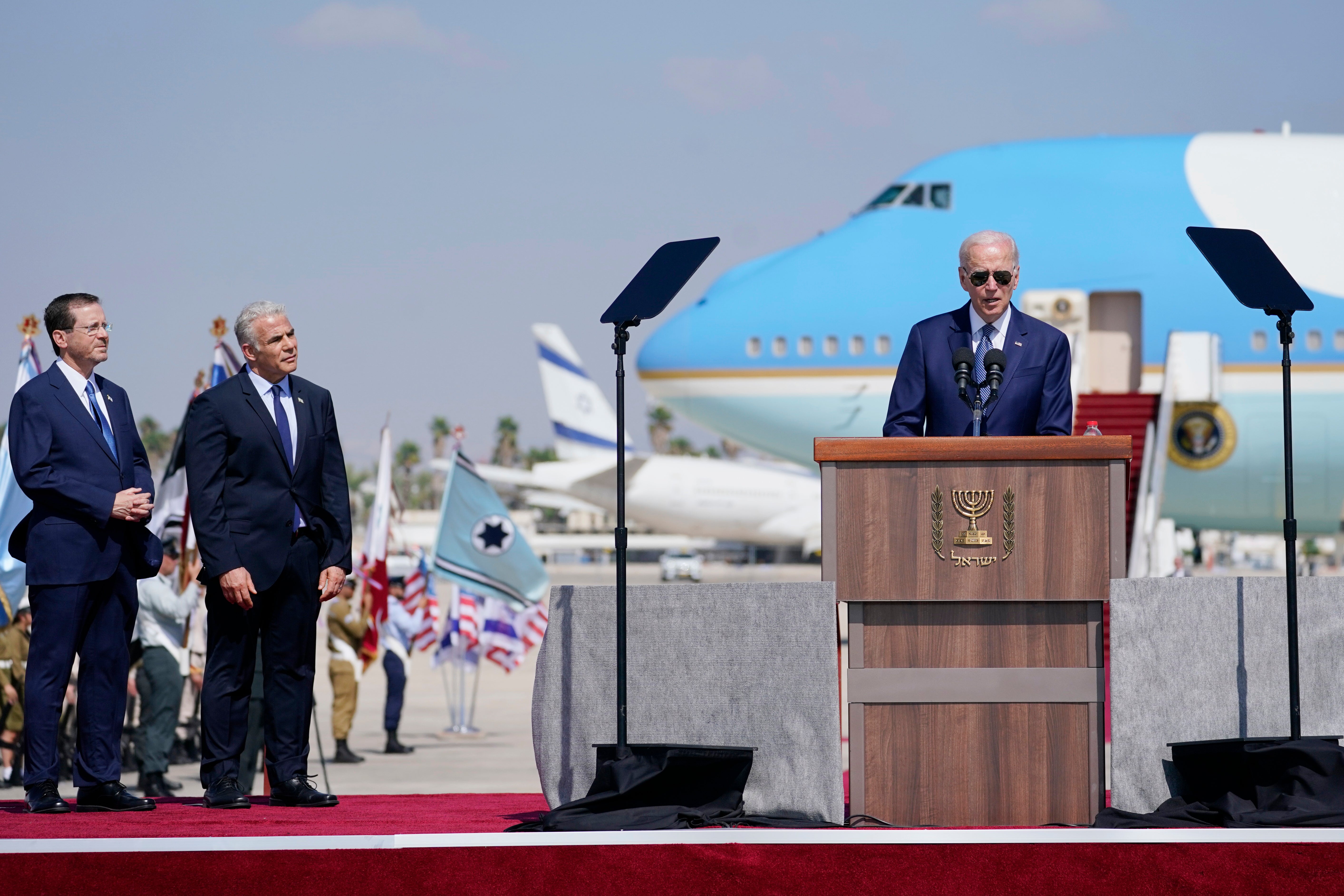 President Joe Biden speaks after arriving at Ben Gurion Airport on 13 July 2022