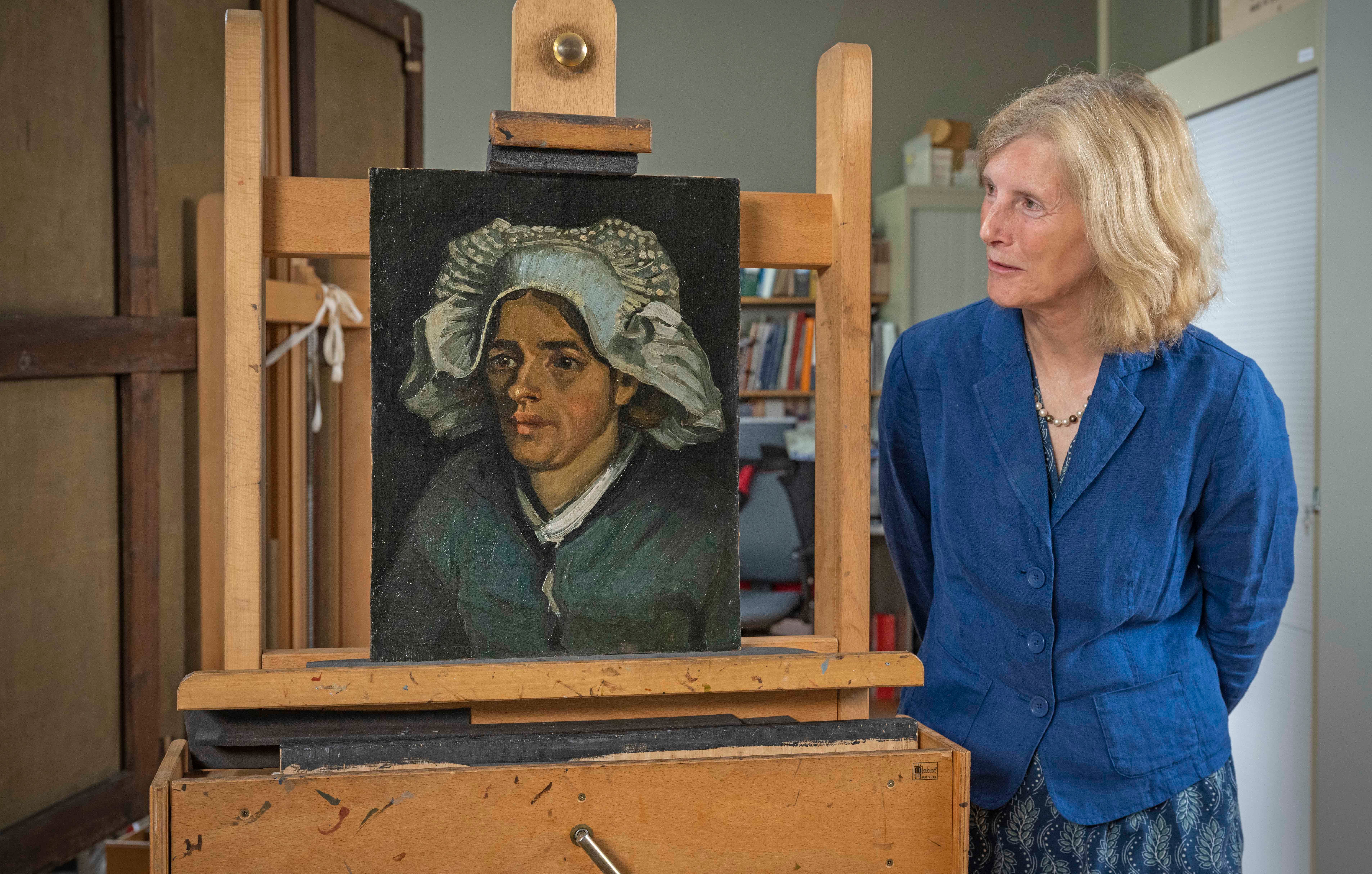 Senior Curator Frances Fowle views Head of a Peasant Woman byVincent Van Gogh. (Neil Hanna/National Galleries of Scotland)