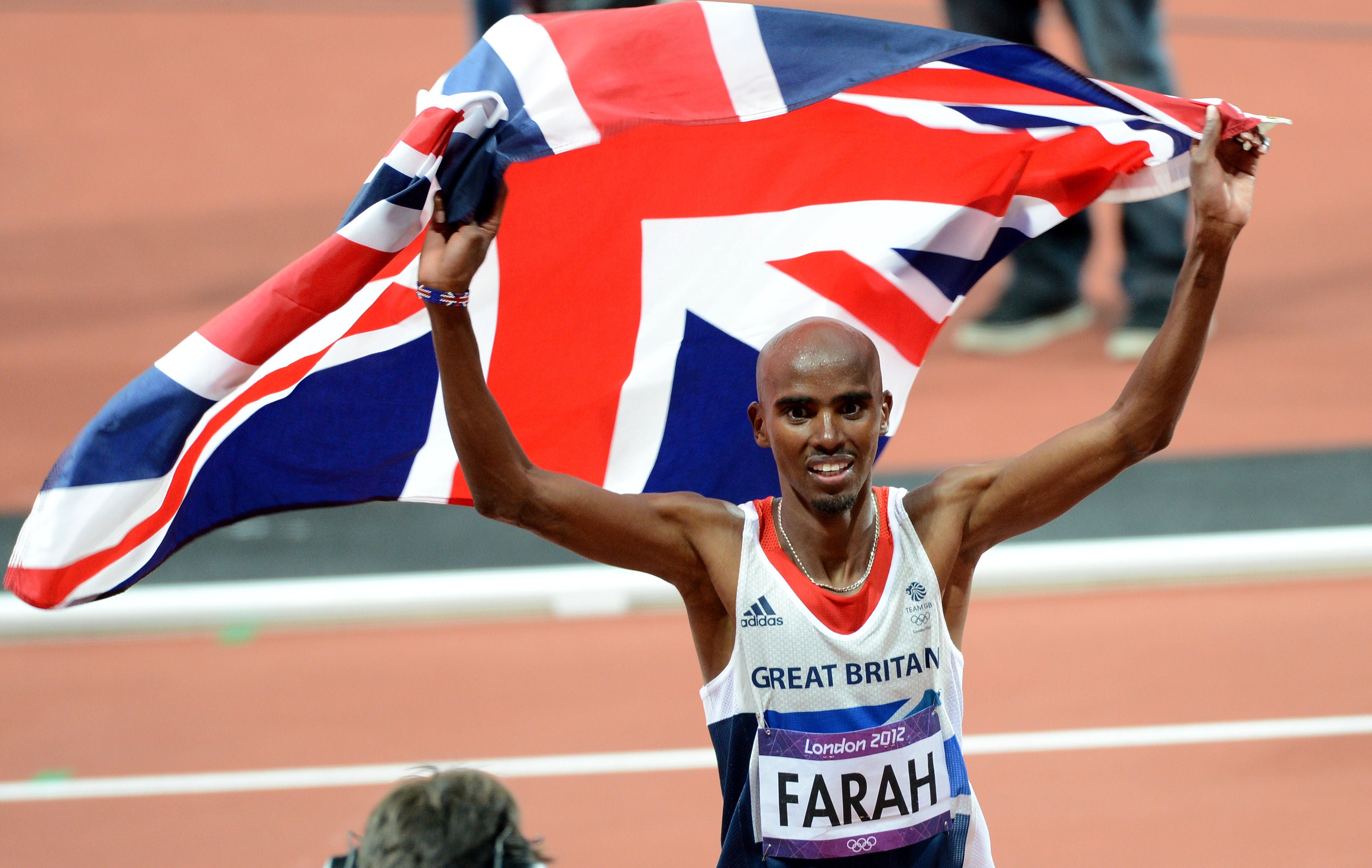 Great Britain’s Mo Farah celebrates winning the Men’s 10,000m final at the Olympic Stadium, London