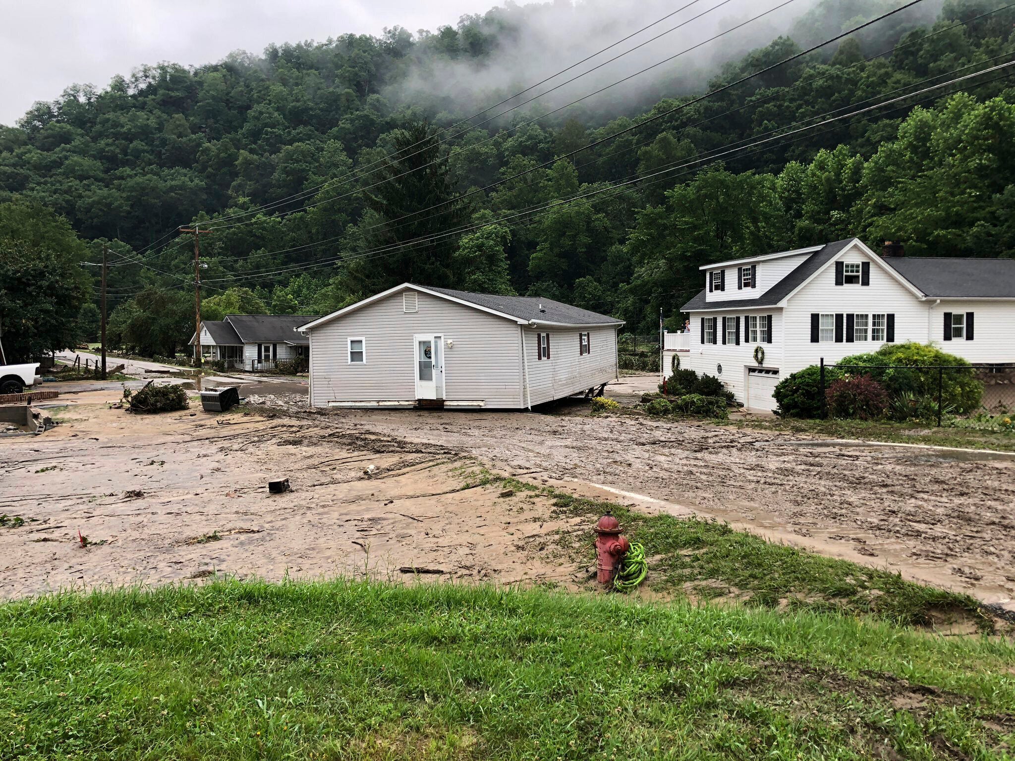 Damage from flooding is shown in the Whitewood community of Buchanan county