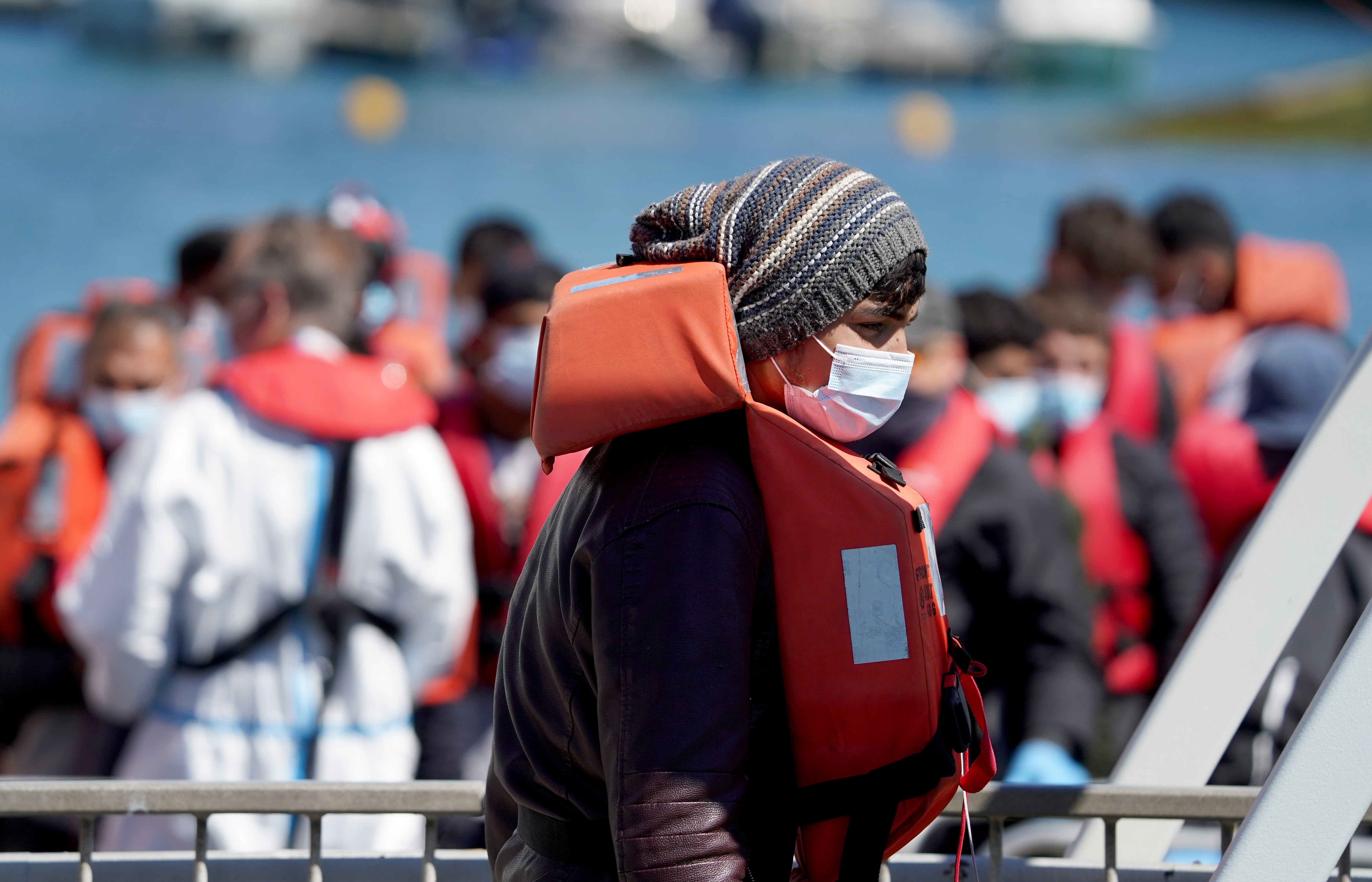 A group of people thought to be migrants are brought in to Dover, Kent, onboard a Border Force vessel following a small boat incident in the Channel (Gareth Fuller/PA)