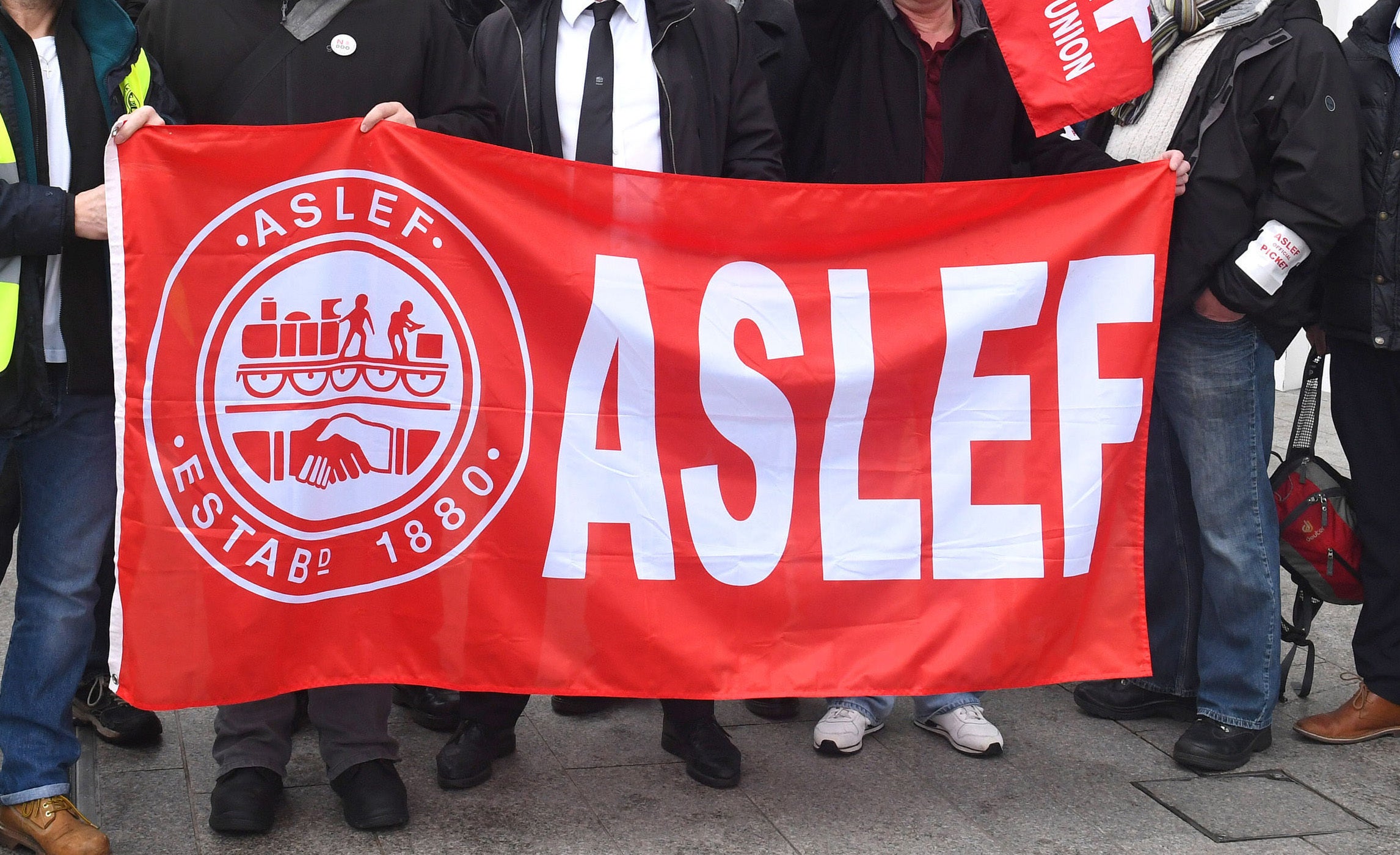 An Aslef flag on a picket line at a previous strike by the train driver members