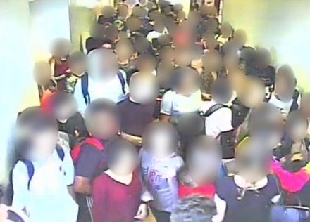 Surveillance footage of the third floor of the school building as students believed a fire drill was under way