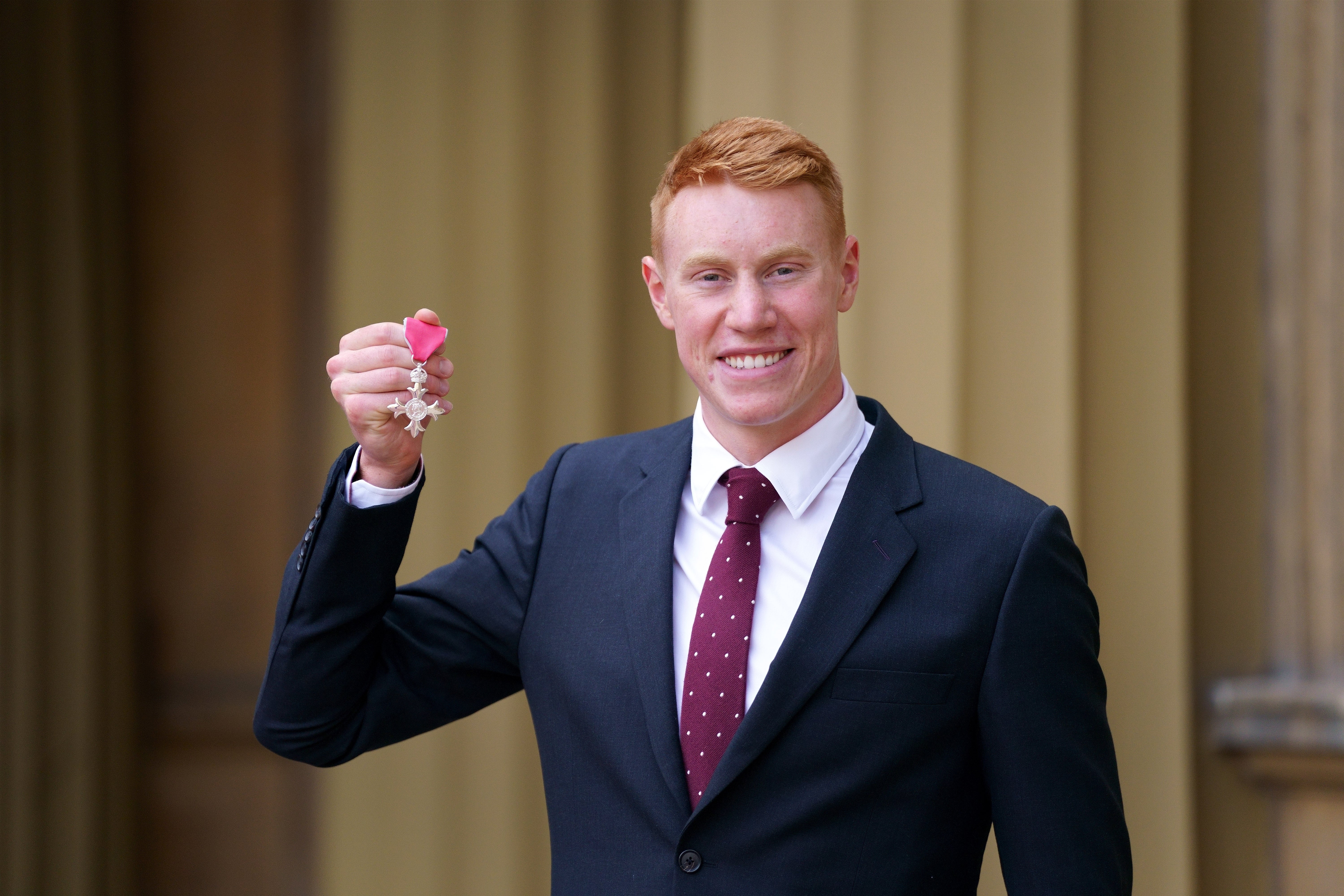 Tom Dean at the investiture ceremony at Buckingham Palace (Victoria Jones/PA)