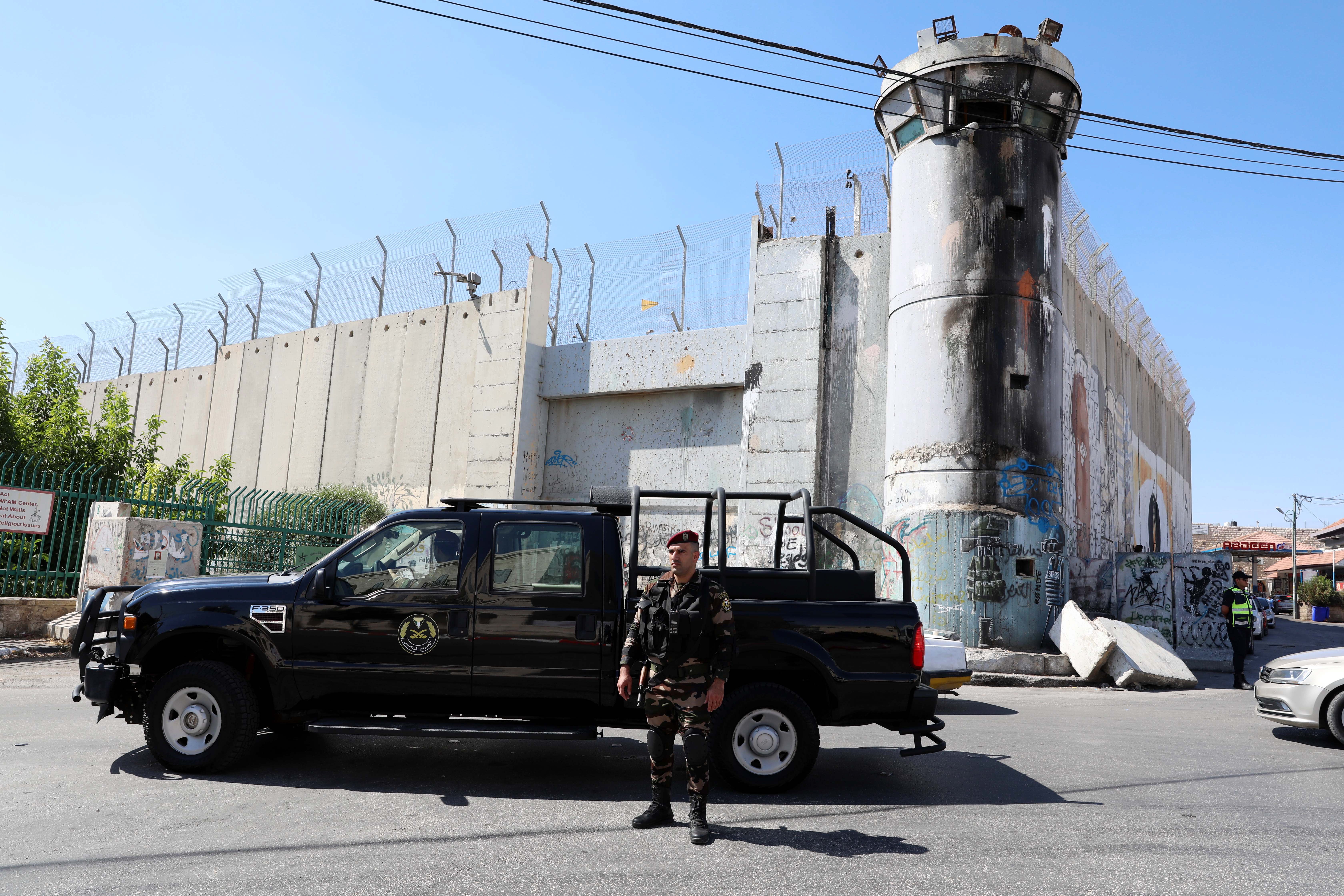 Palestinian police on patrol where US president Joe Biden’s convoy is expected to pass in the West Bank city of Bethlehem, 14 July 2022