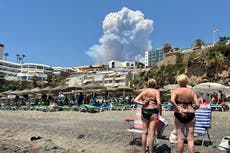 Thousands flee wildfires in France as temperatures soar across Europe