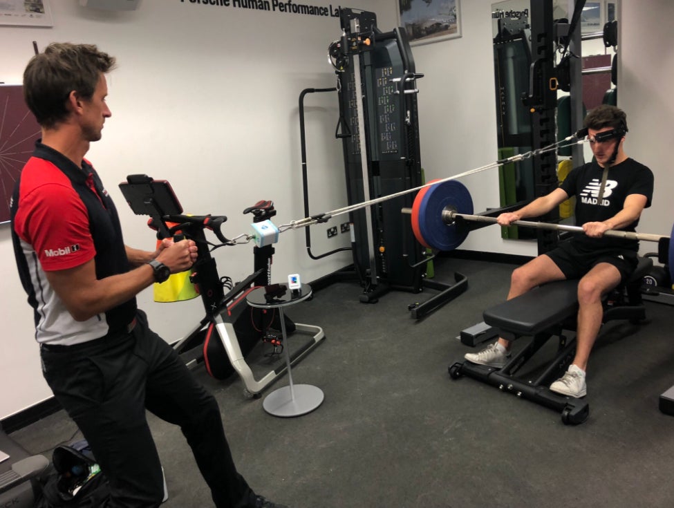 The Independent takes part in a neck strength test at the Porsche Human Performance Centre at Silverstone