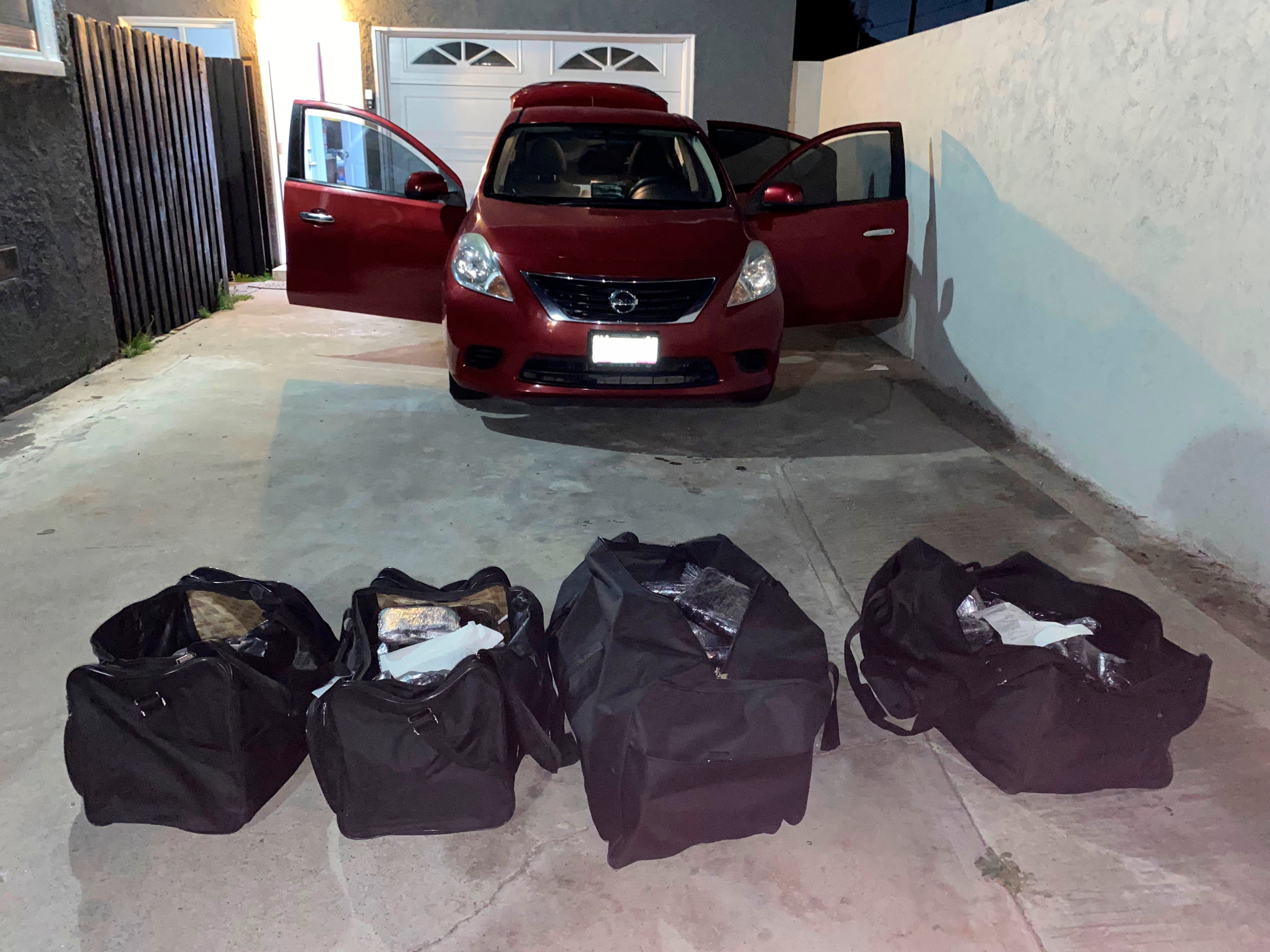 This undated photo provided by the U.S. Drug Enforcement Administration, Los Angeles Field Division, shows bags of some of the seized approximately 1 million fake pills containing fentanyl that were seized when agents served a search warrant, July 5, 2022