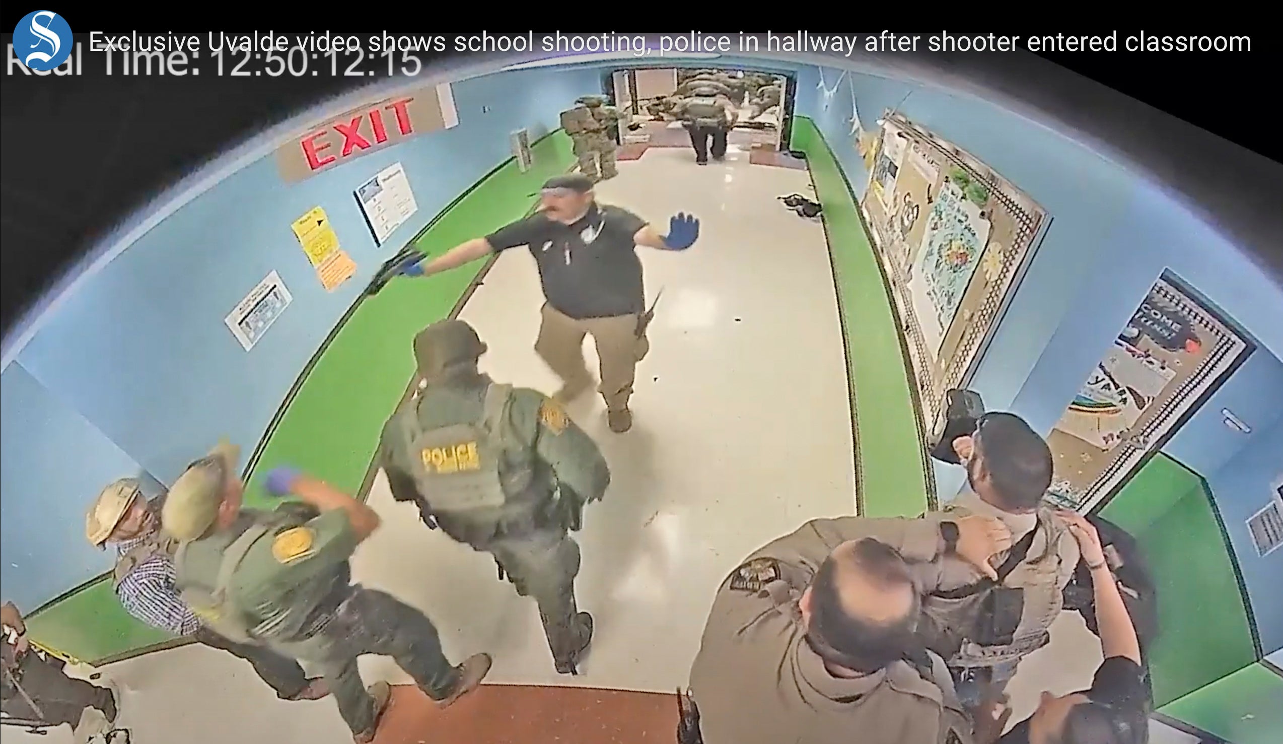 Surveillance footage from inside the hallway during the massacre