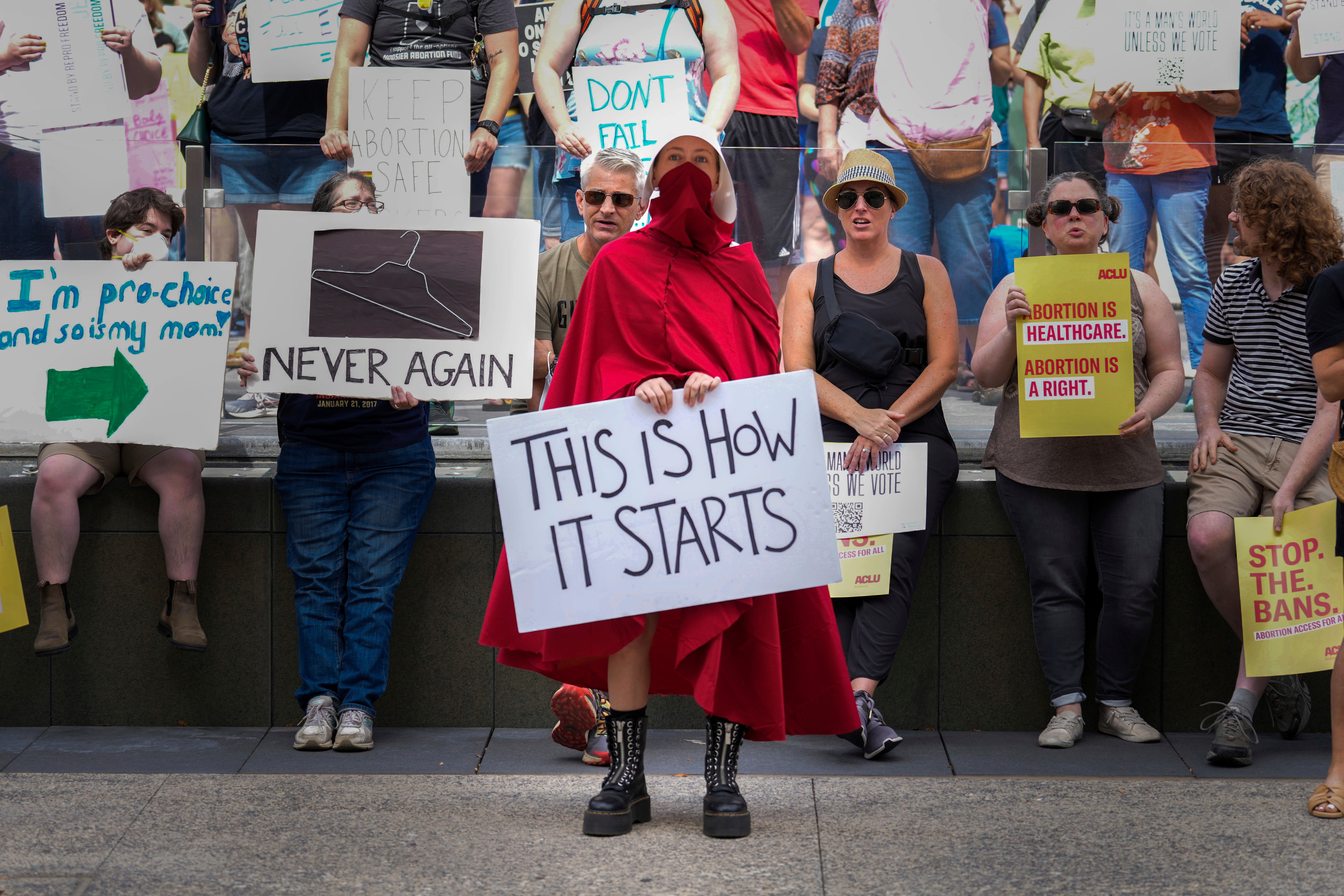 Abortion-rights activists rally at the Indiana Statehouse